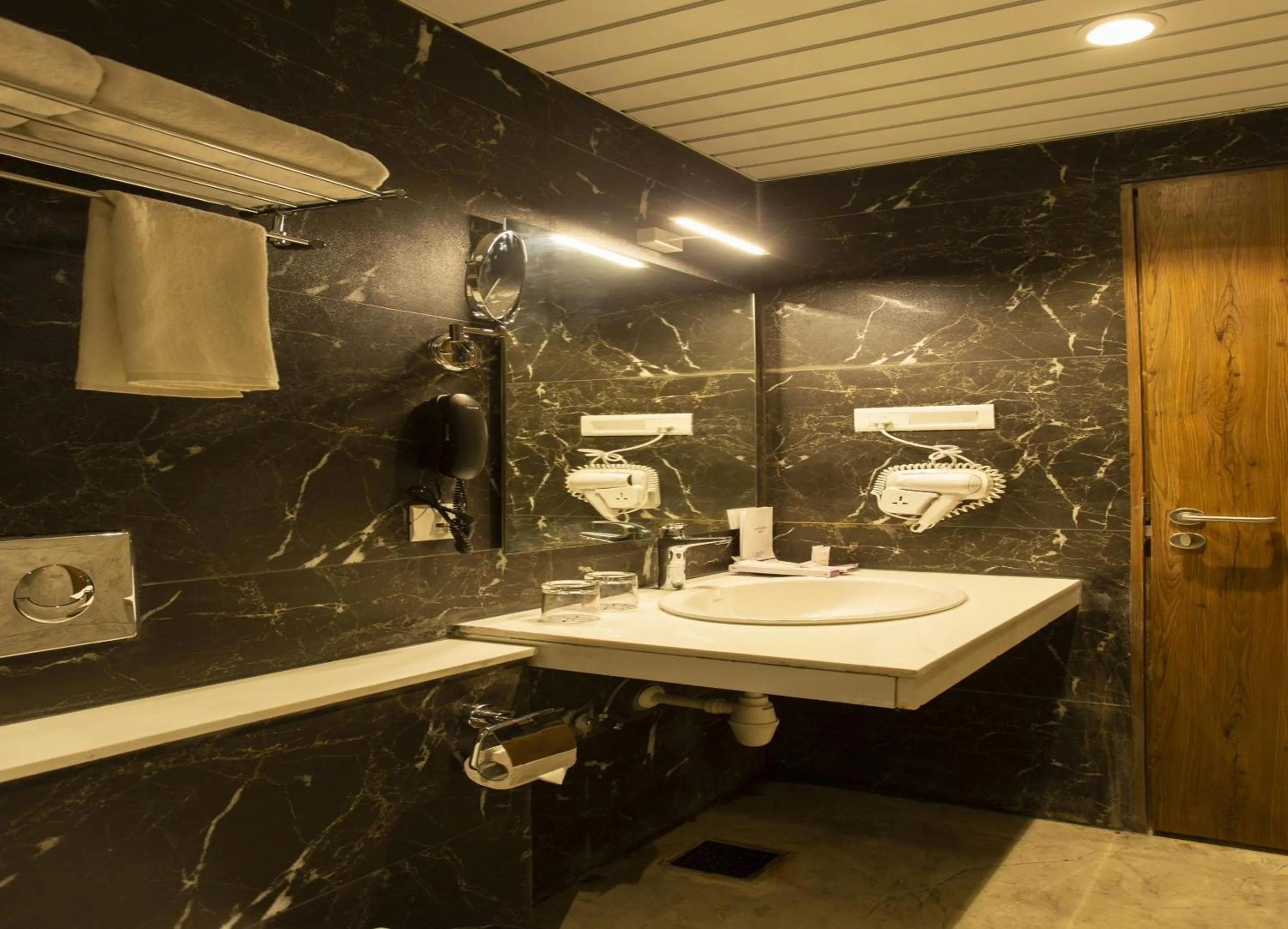 Bathroom in Sarovar Portico, Somnath