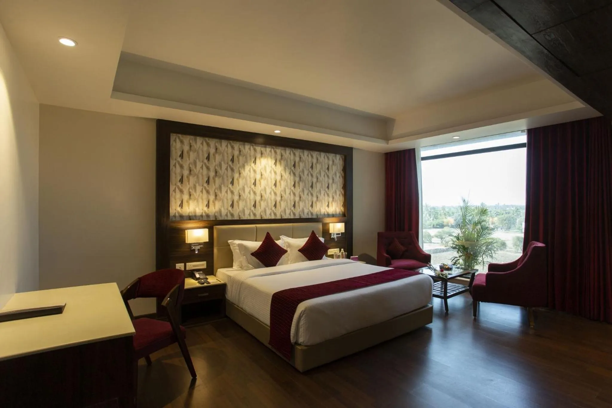 Photo of the whole room, Bed in Sarovar Portico, Somnath