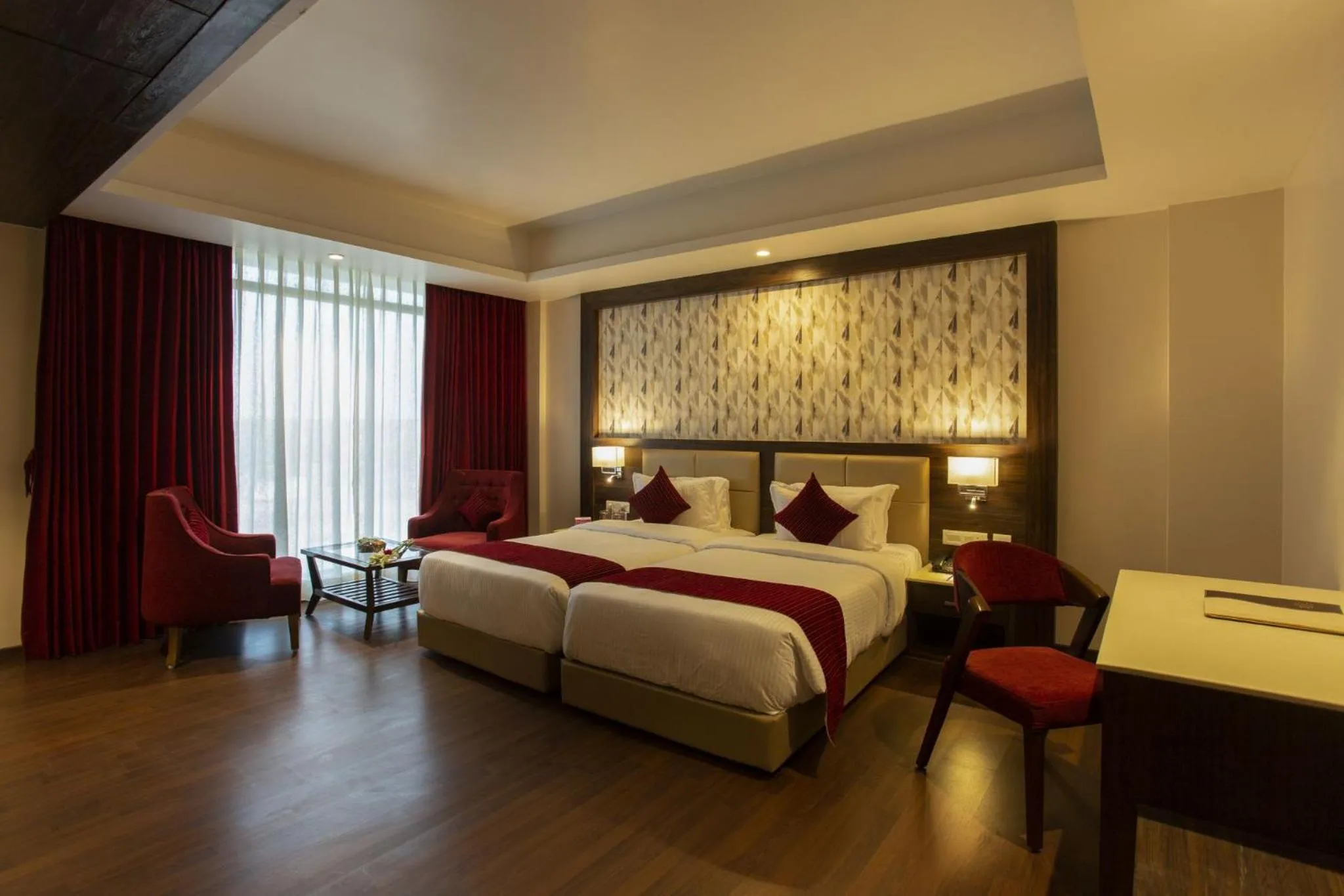 Photo of the whole room, Bed in Sarovar Portico, Somnath