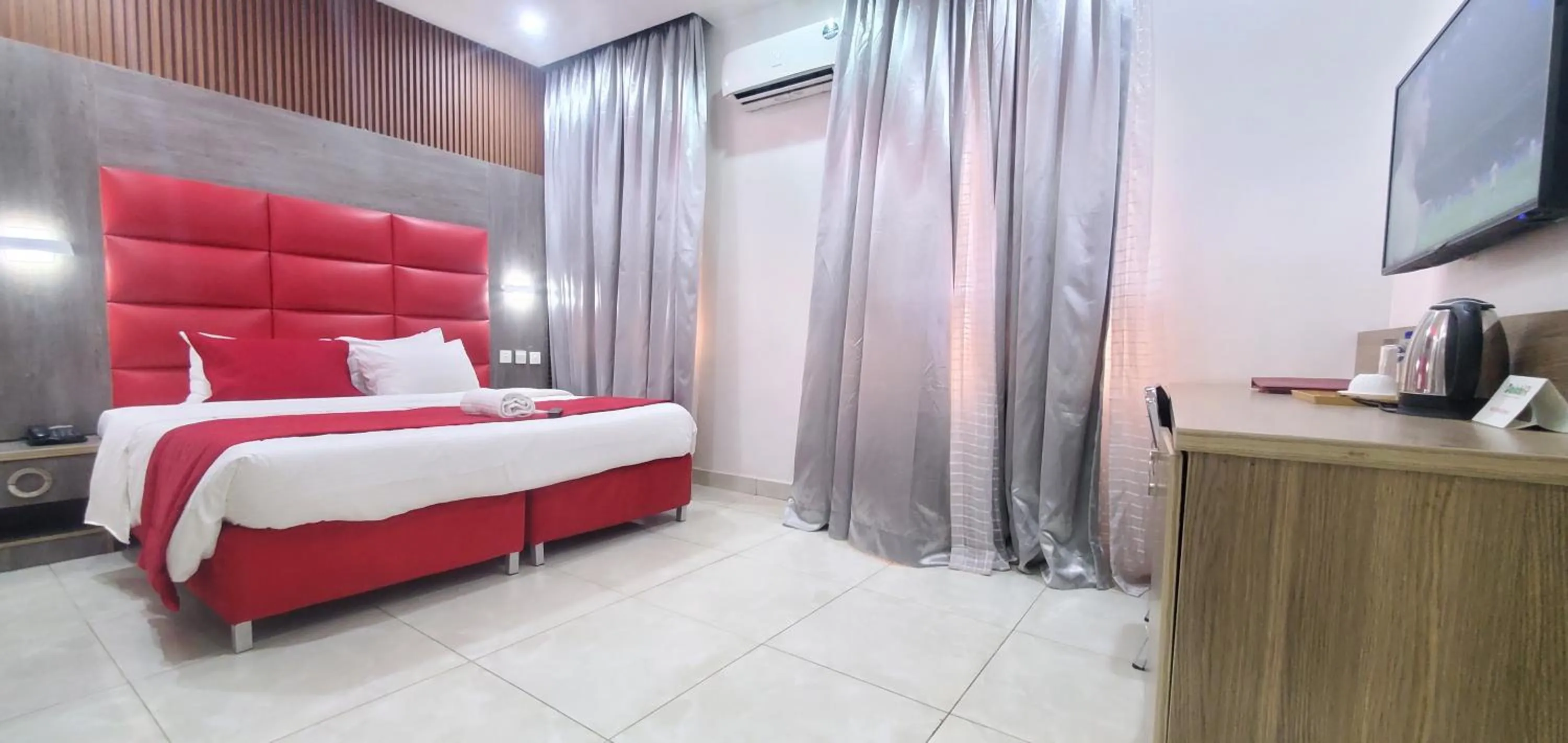 Bed in Dalchifit Suites by Premium Swiss Hospitality