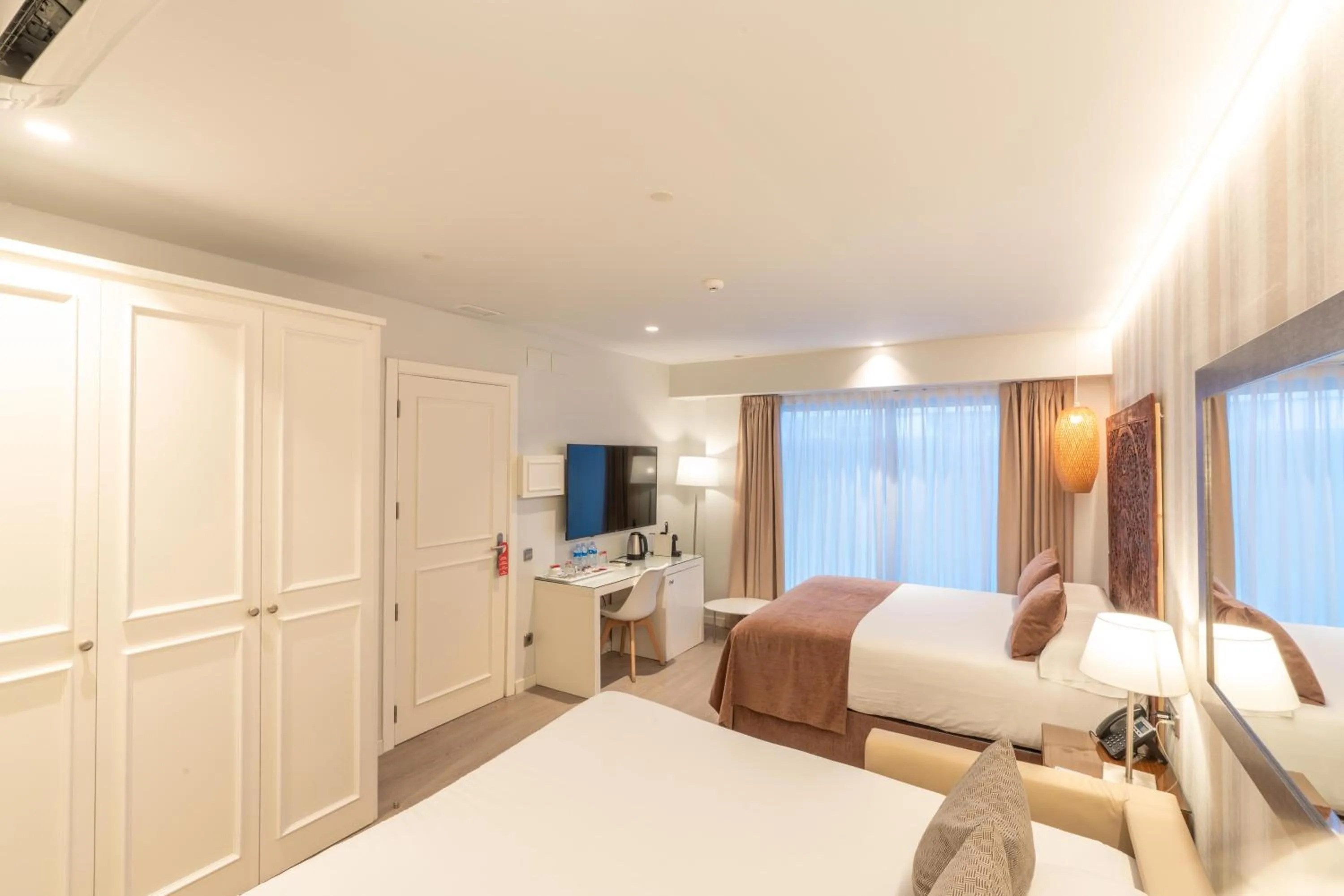 Bed in Serennia Fira Gran Via Exclusive Rooms