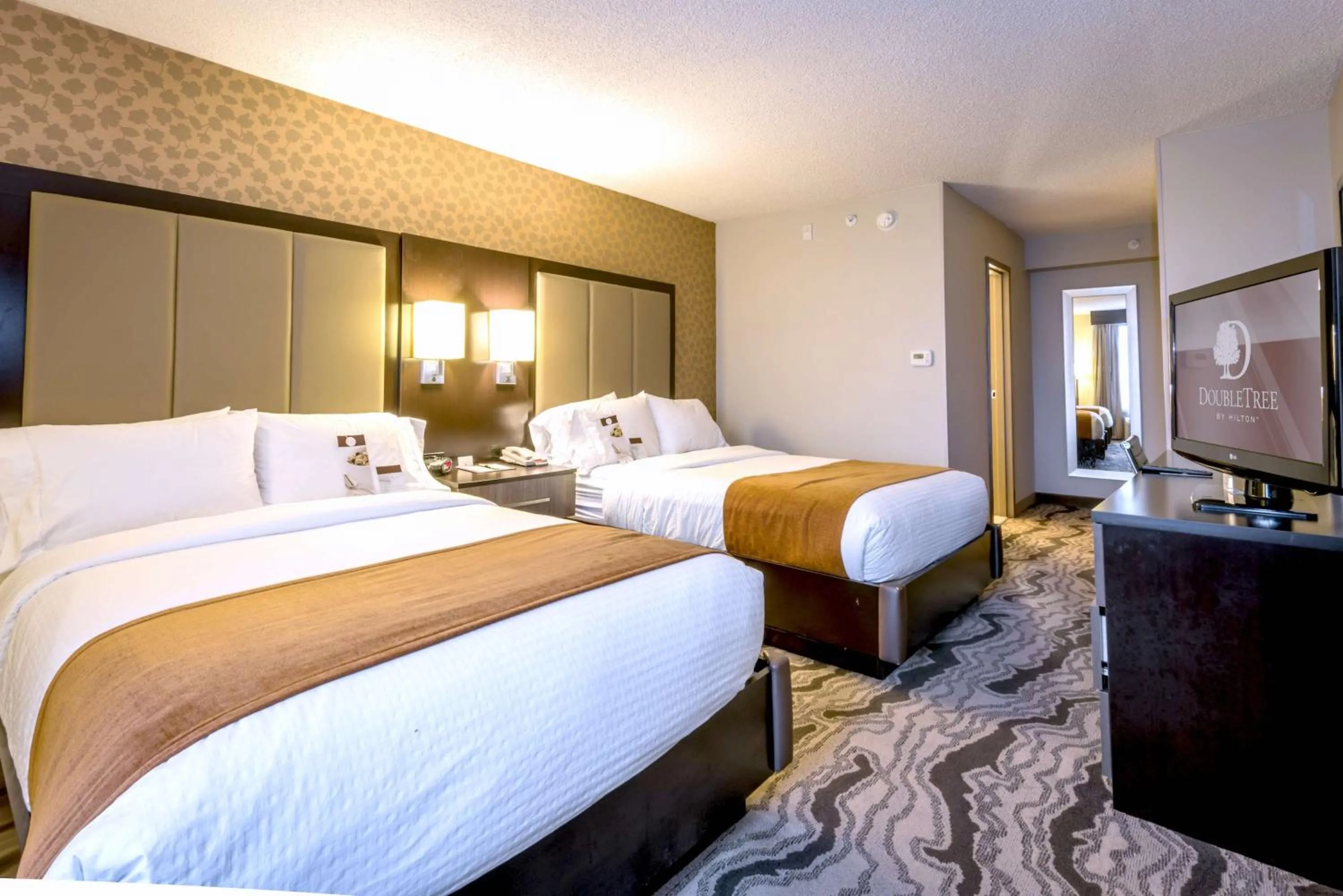 Bed in DoubleTree by Hilton Montgomery Downtown