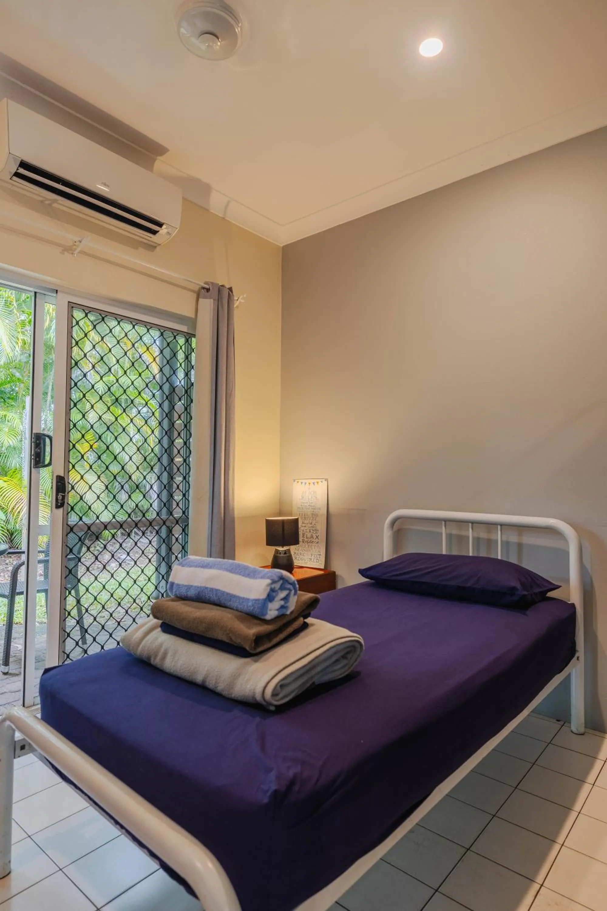 Photo of the whole room, Bed in Coral Beach Lodge