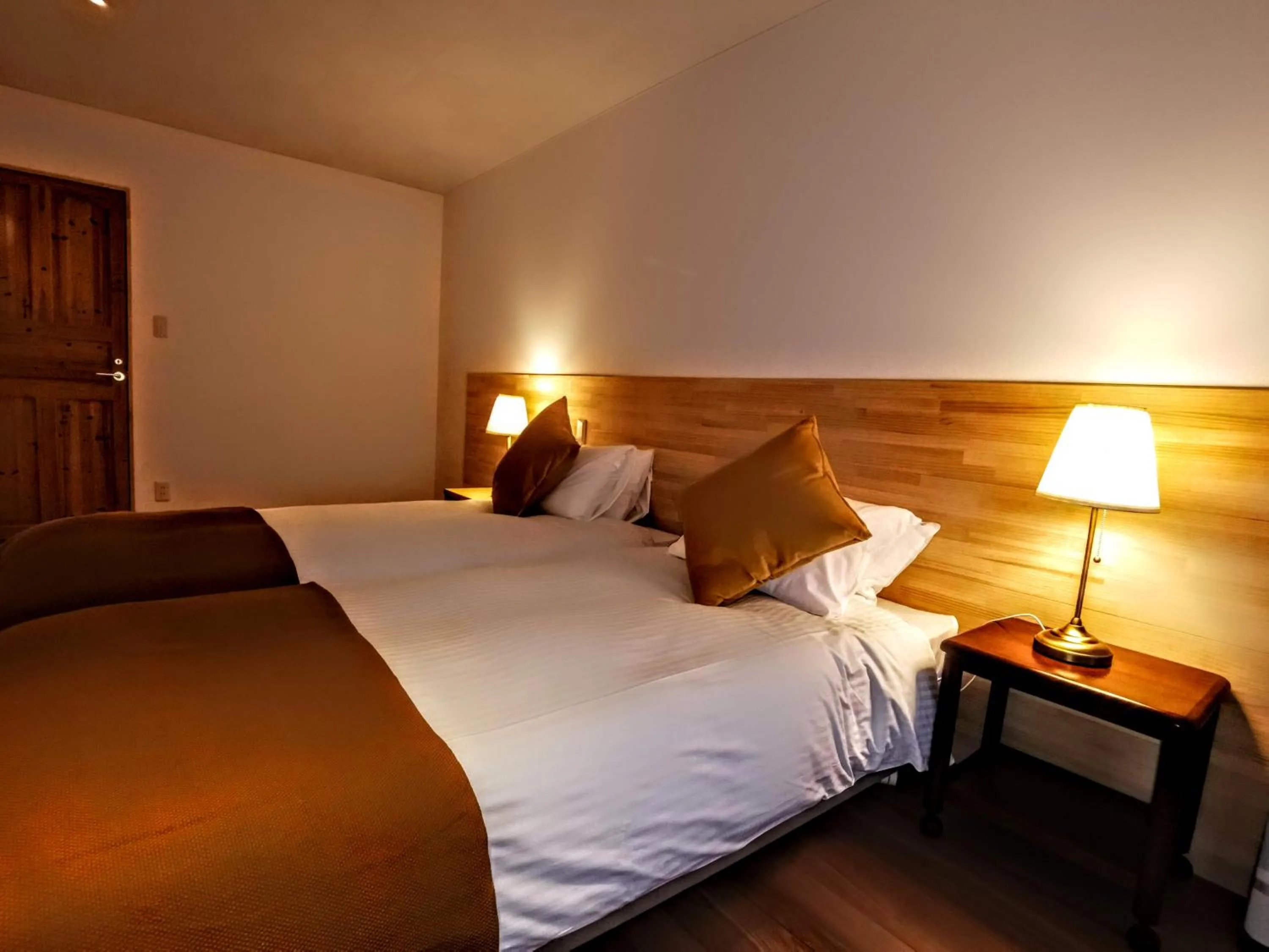 Bed in Fujio Pension Madarao Apartment Hotel & Restaurant