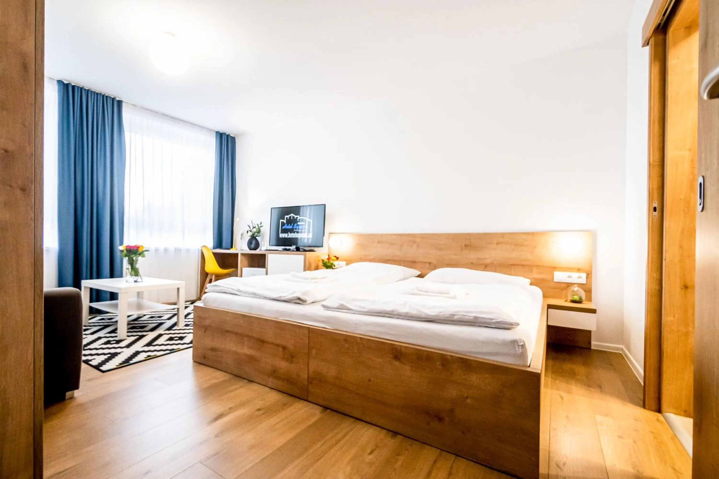 Bed in Hotel Squash Dependance