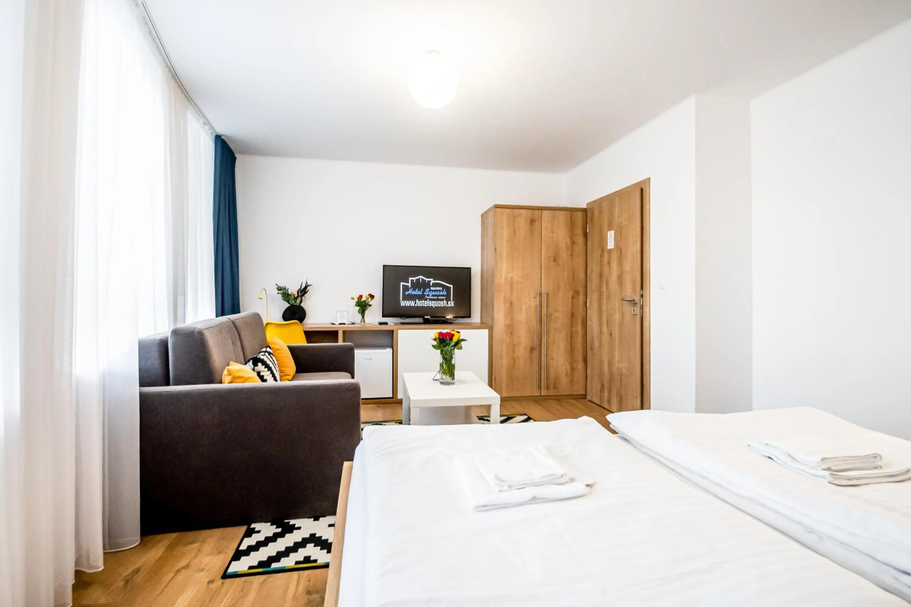 Bed in Hotel Squash Dependance