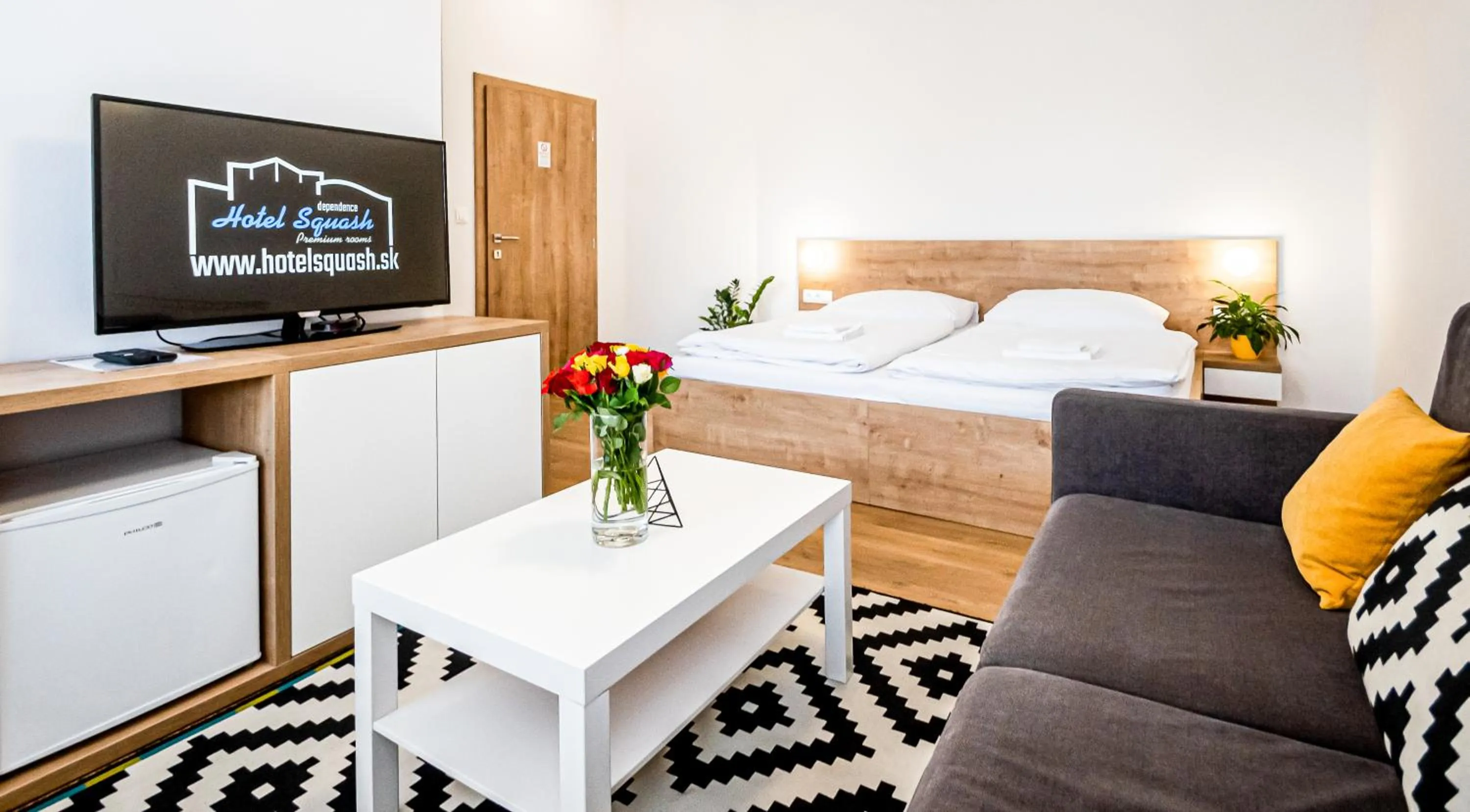 Bed in Hotel Squash Dependance