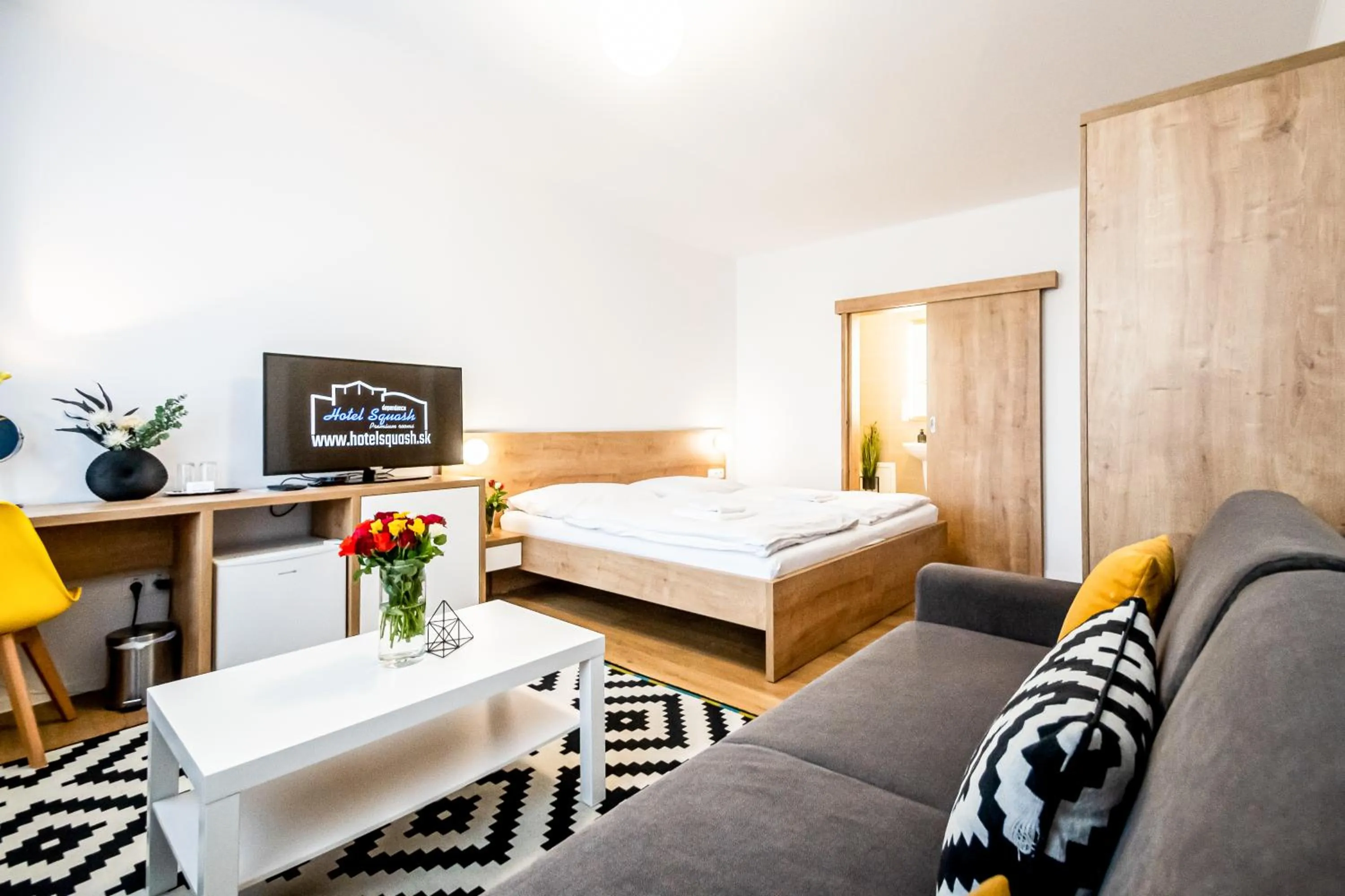 Bed in Hotel Squash Dependance