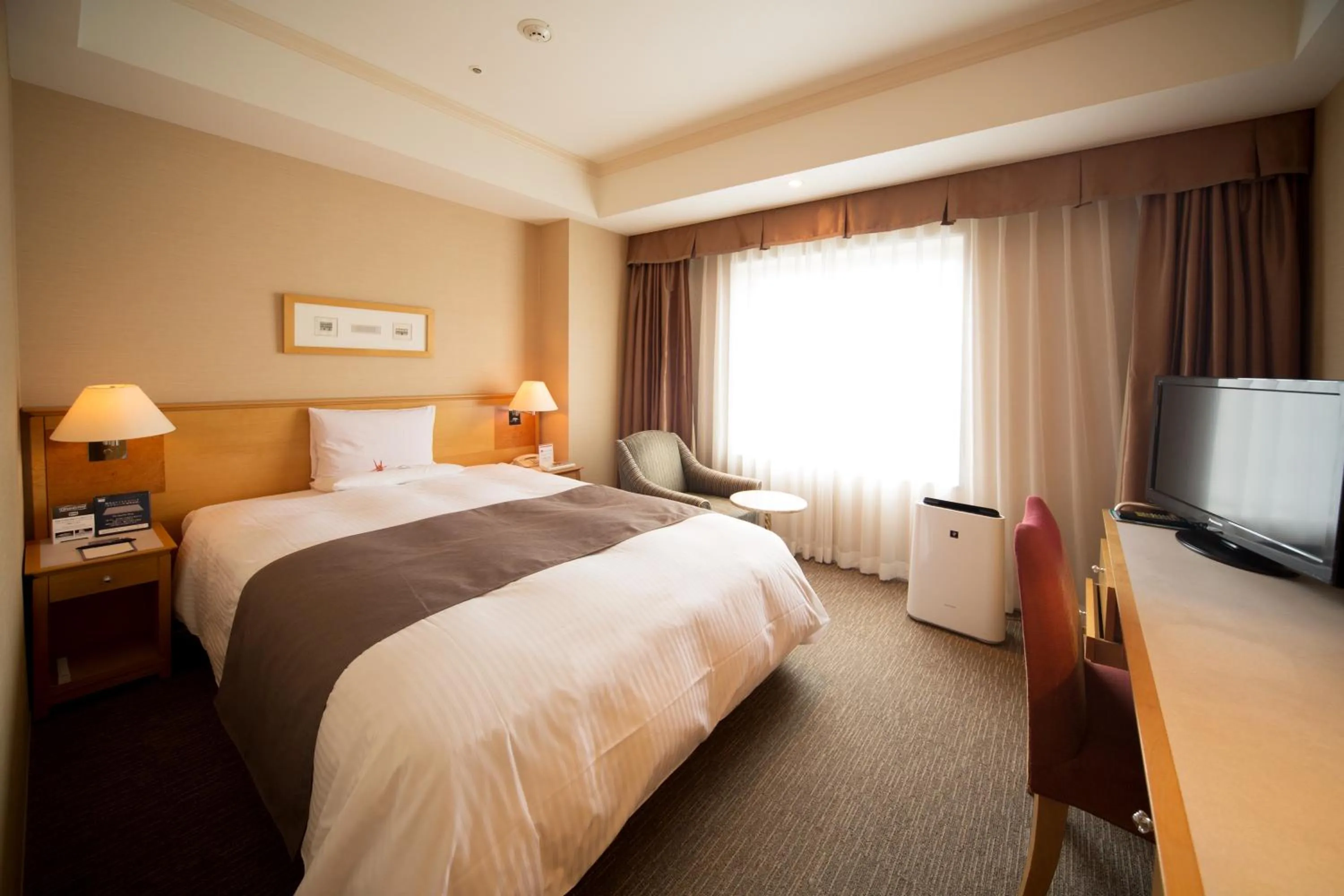 Bed in Rembrandt Hotel Ebina