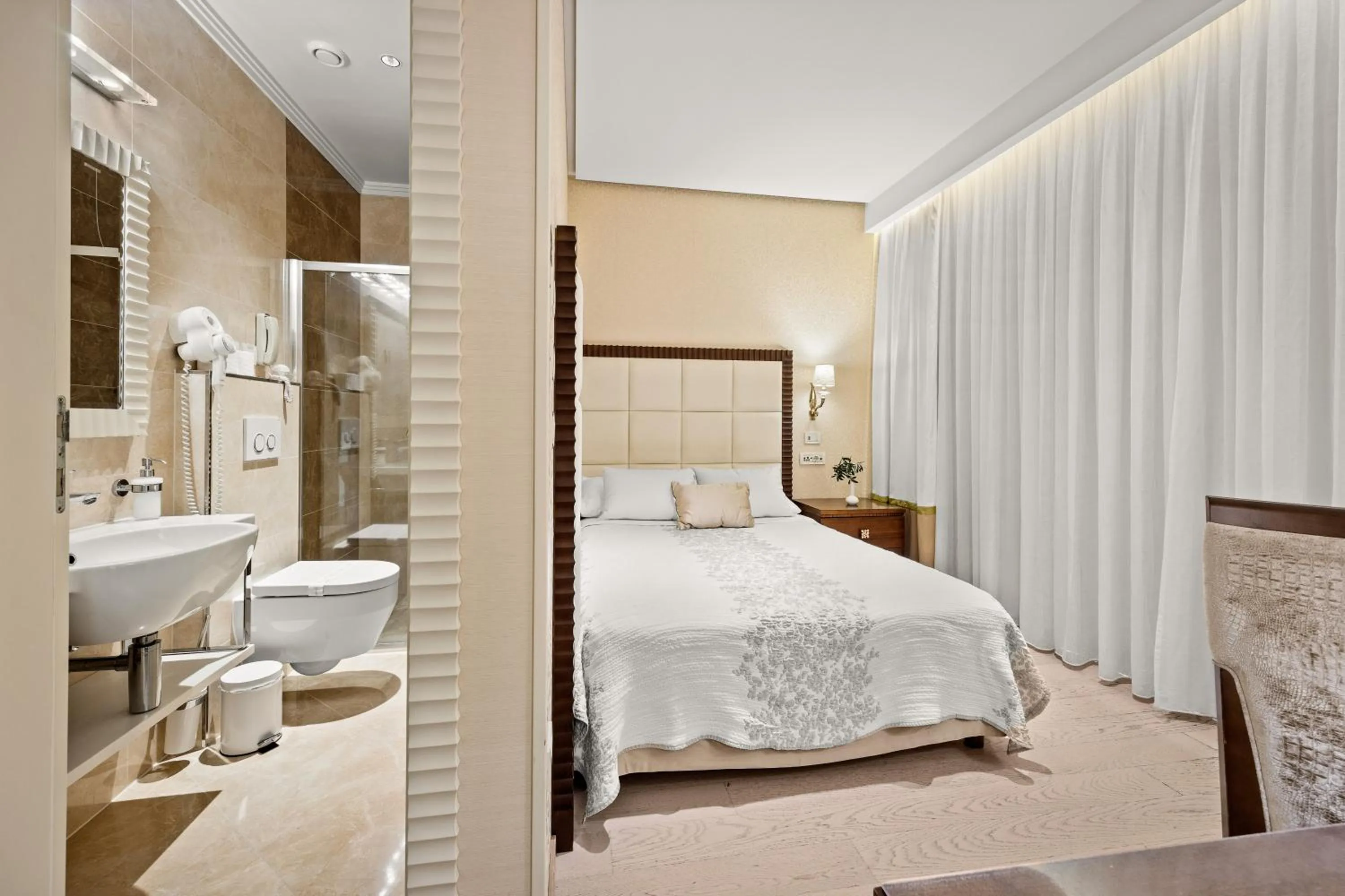 Bed in Boutique Hotel Oasi