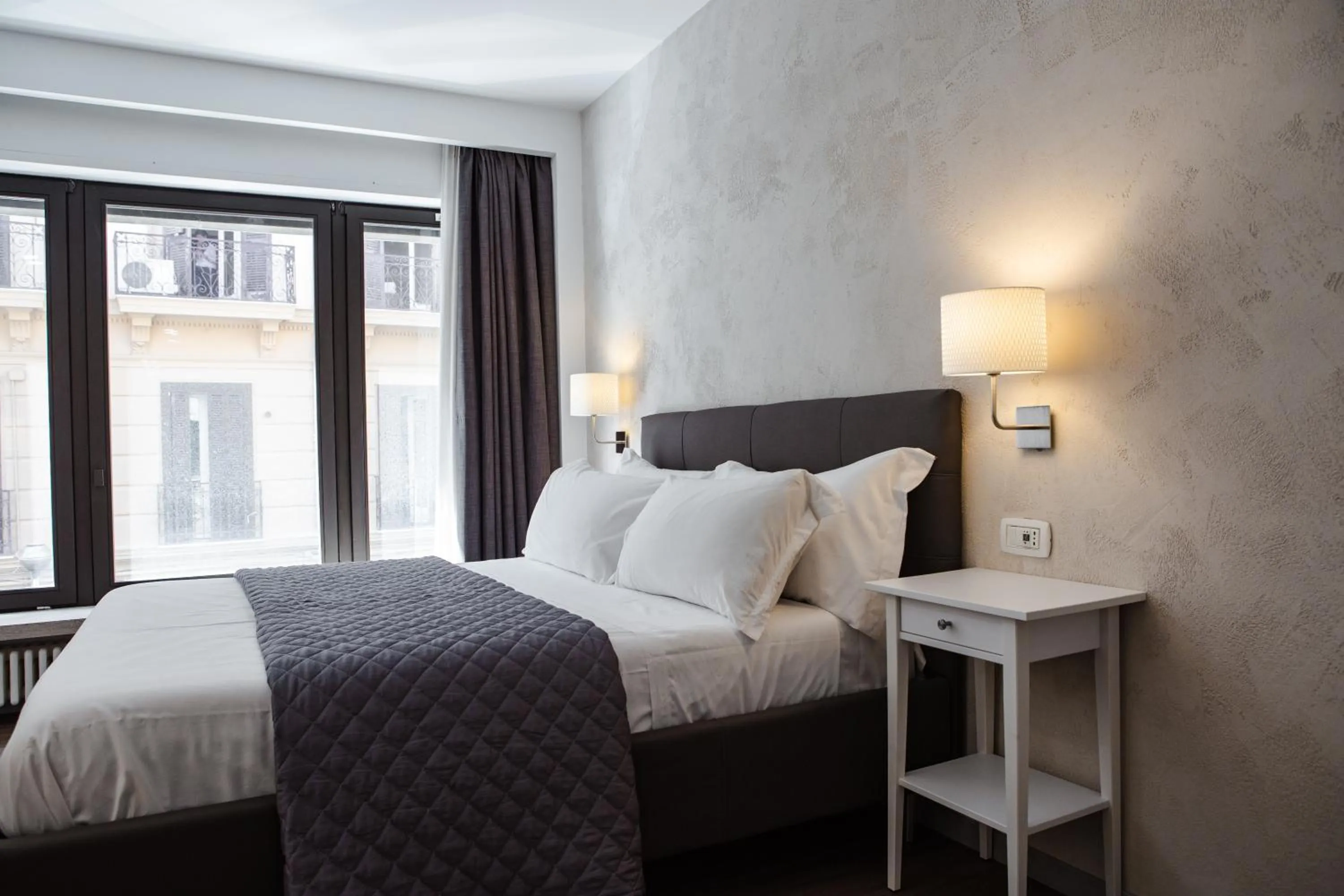 Bed in Prestige Rooms Chiaia Hotel