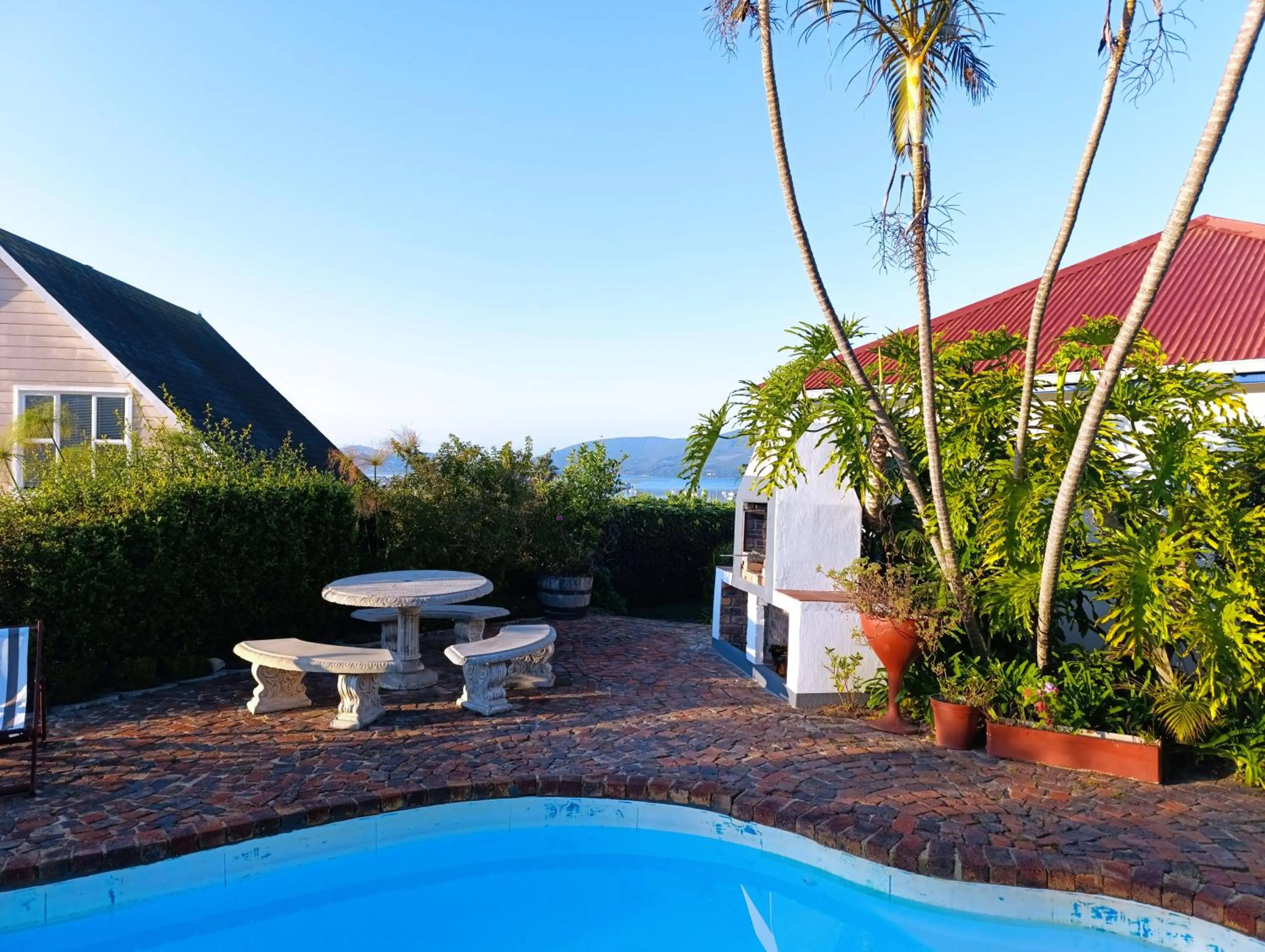 Swimming pool in Guinea Fowl Lodge - Lagoon & Heads View B&B, Central Knysna