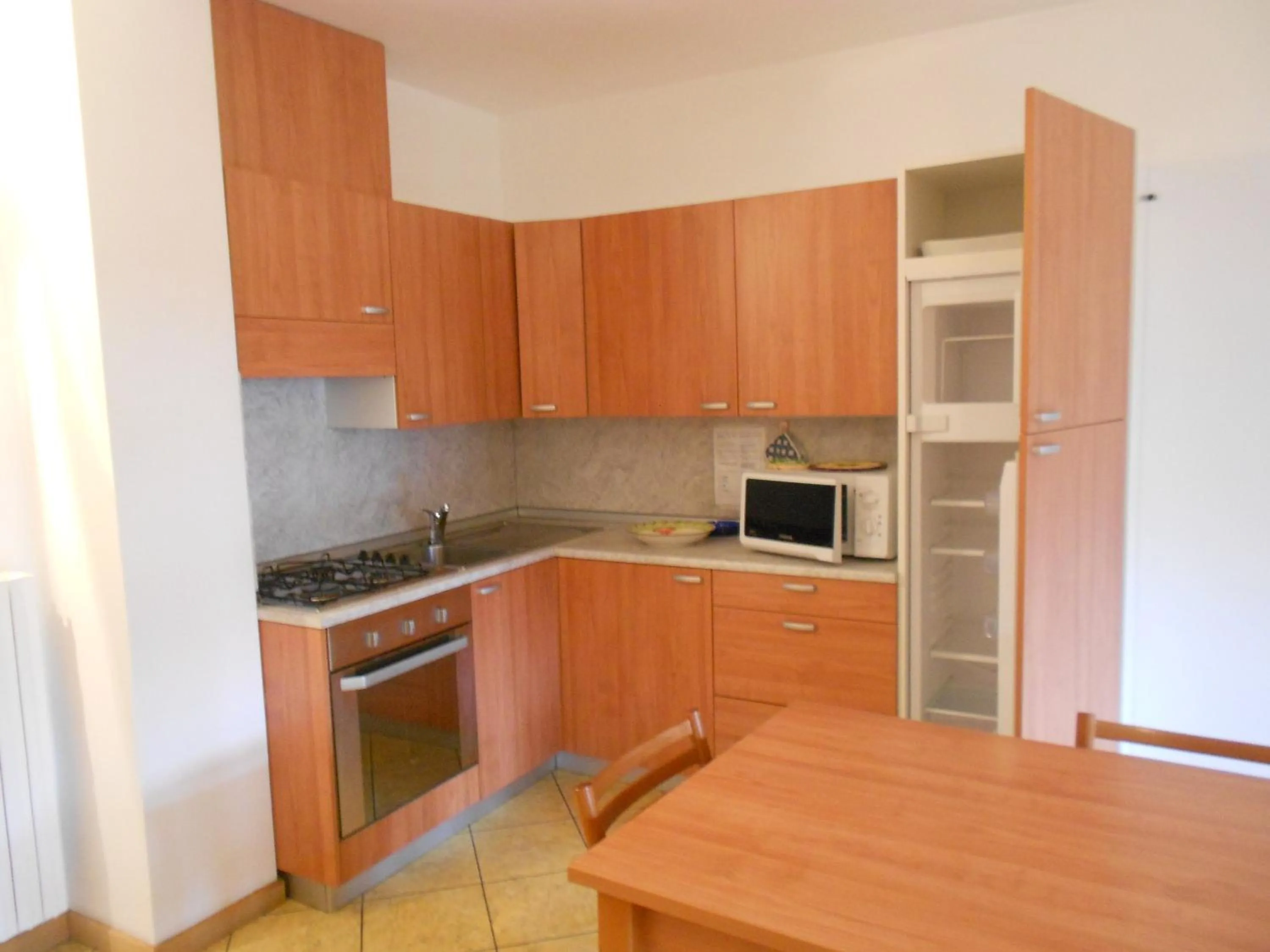 Kitchen or kitchenette in Residence Le Orchidee