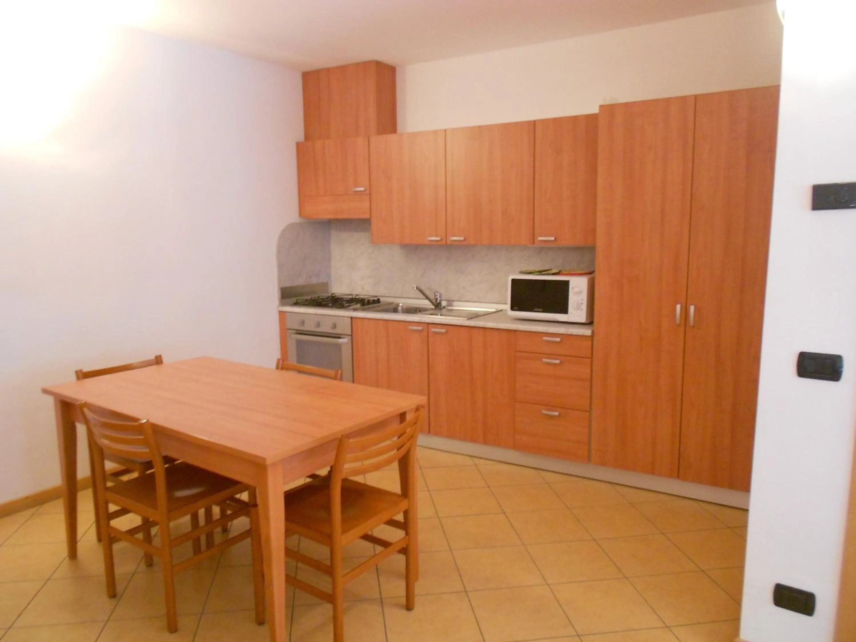 Kitchen or kitchenette in Residence Le Orchidee