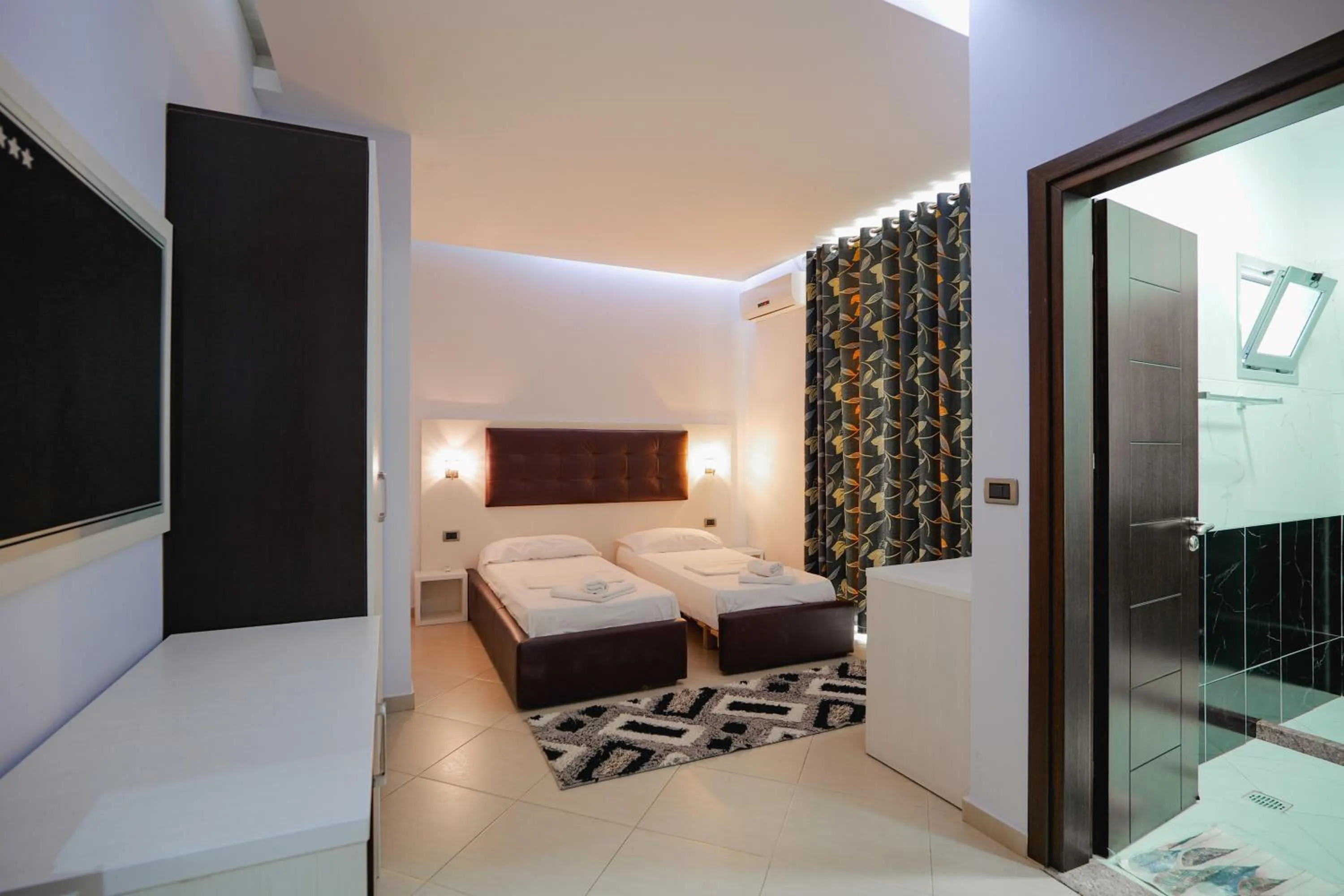 Bedroom in Grand Hotel Aita