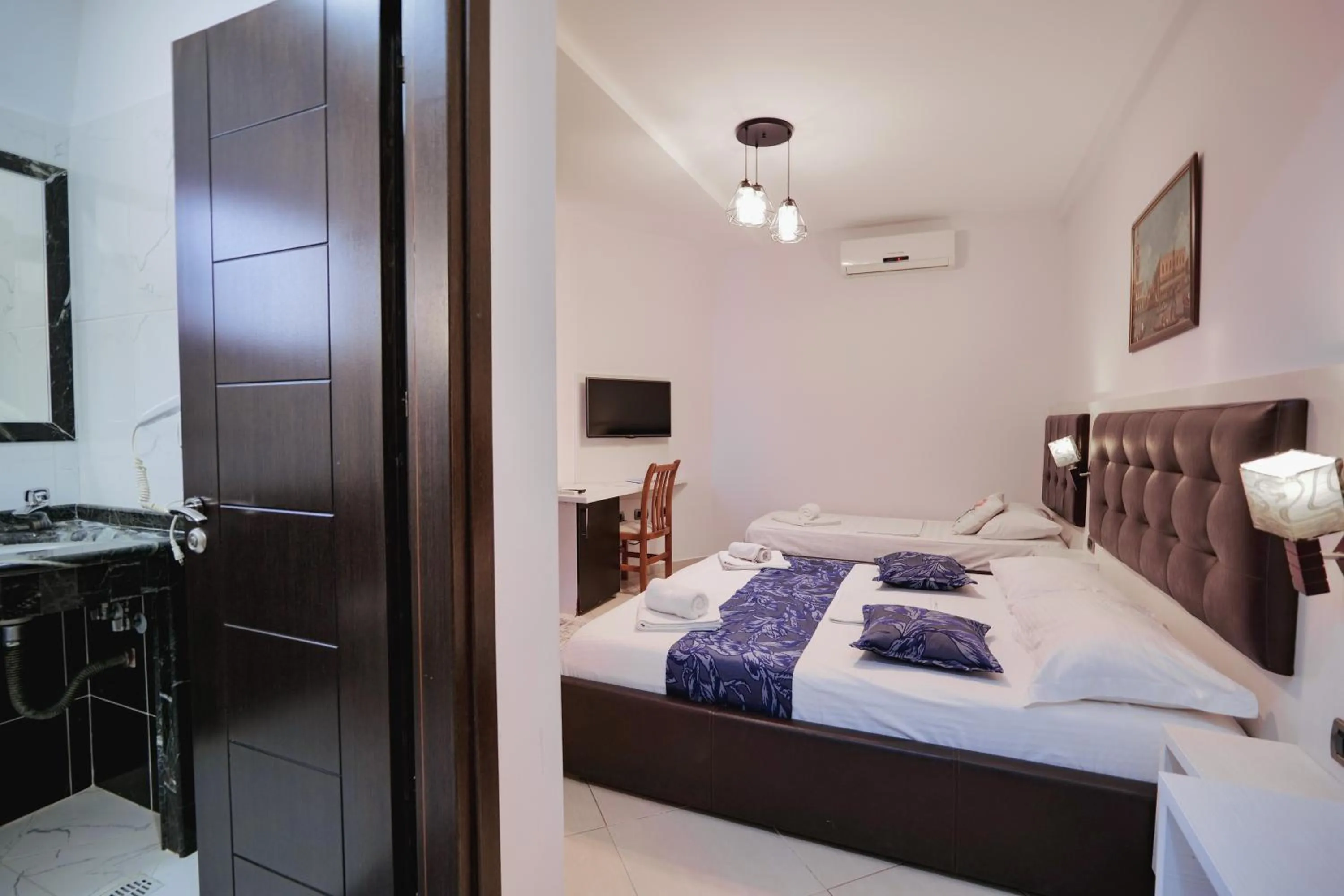 Communal lounge/ TV room in Grand Hotel Aita