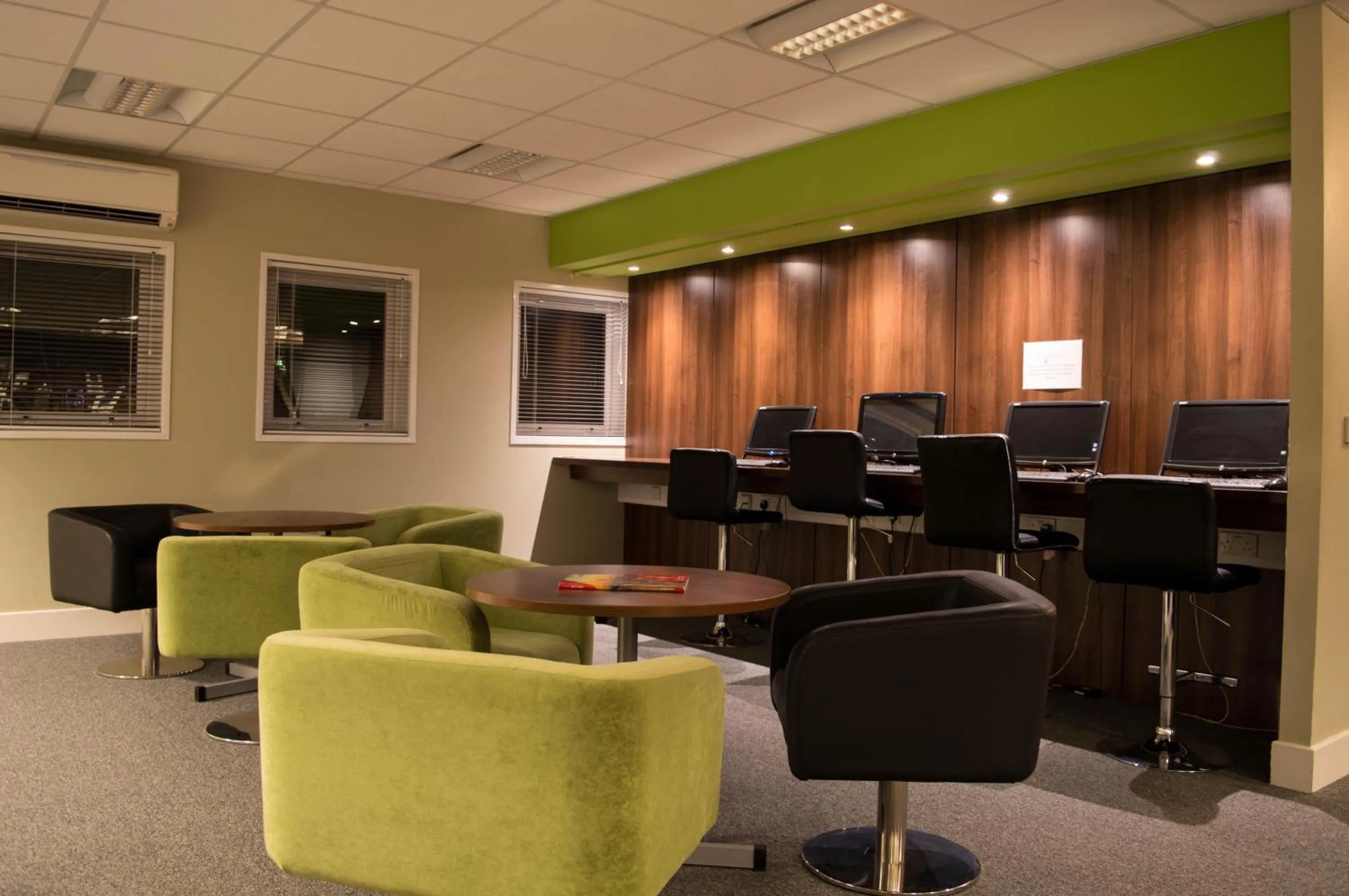 Communal lounge/ TV room in Nightel Hotel