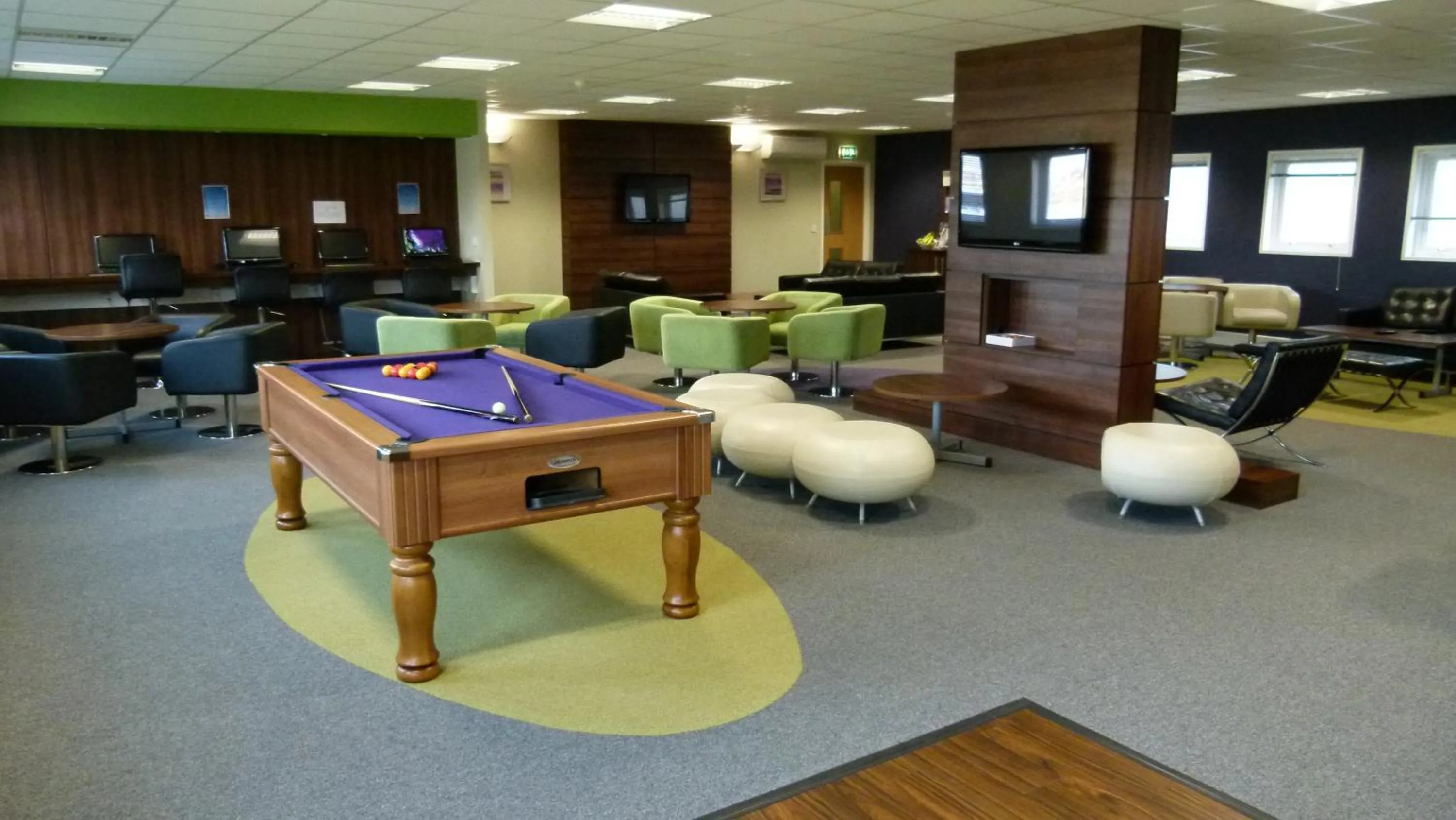 Communal lounge/ TV room in Nightel Hotel