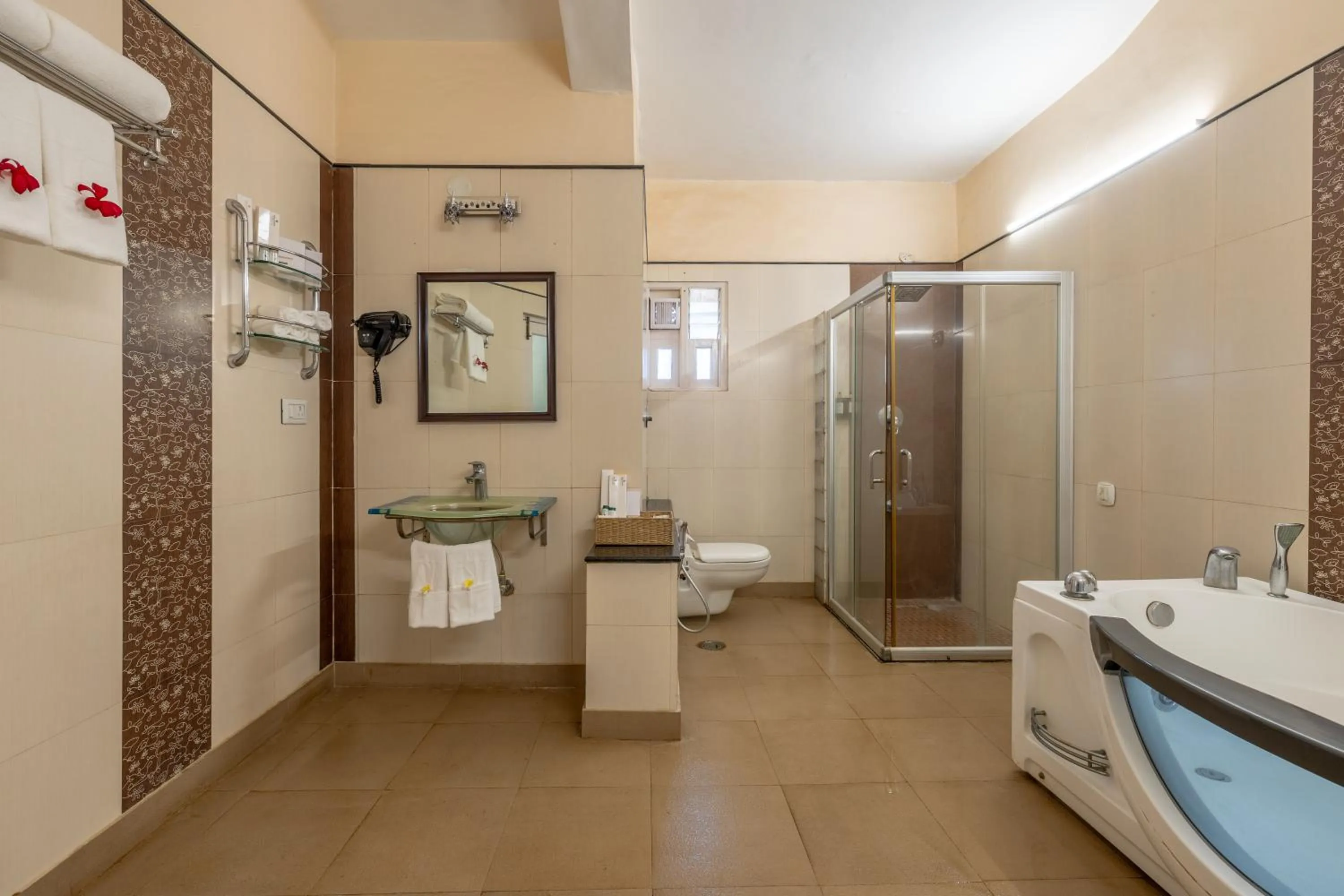 Bathroom in Vijayshree Resort, Hampi