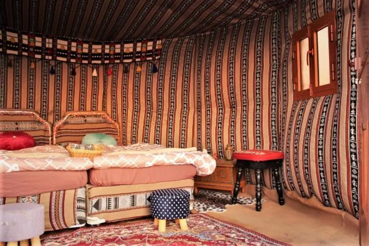 Bed in Queen Desert camp