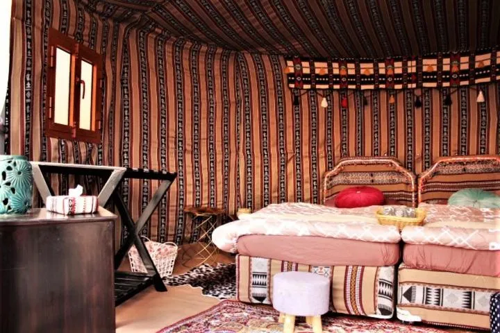 Bed in Queen Desert camp