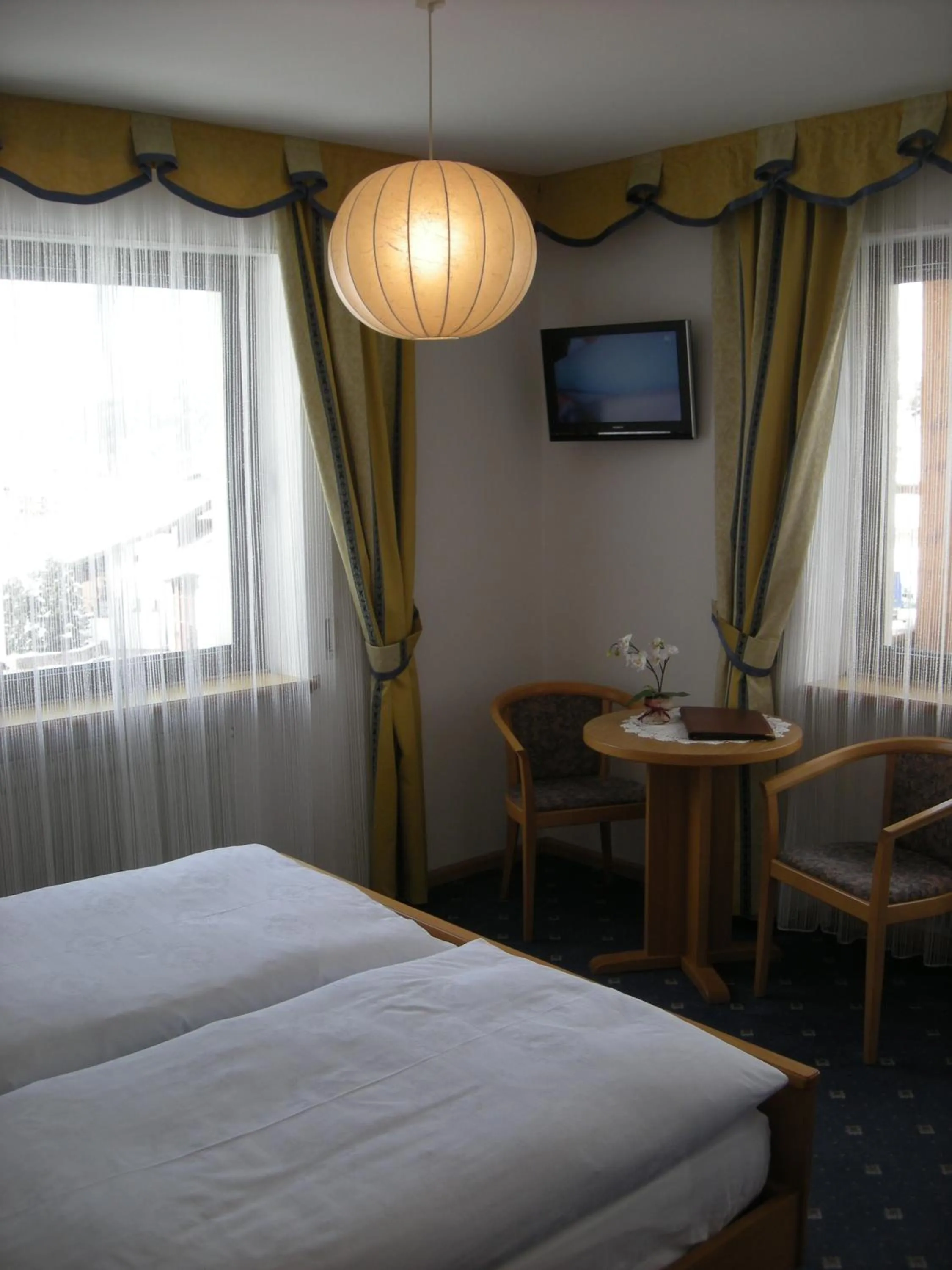 Photo of the whole room, Bed in Garni Hotel Rezia