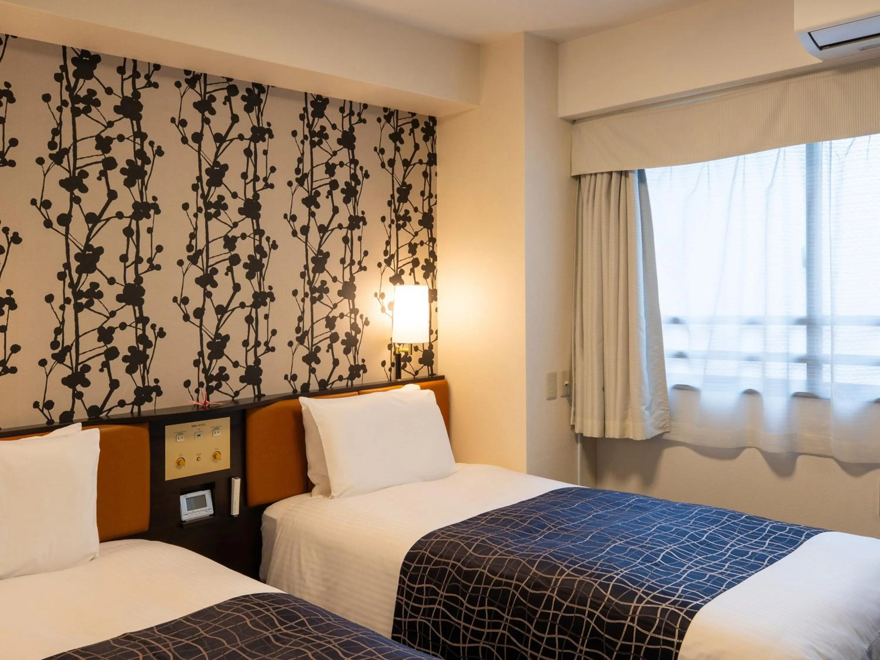 Bed in APA Hotel Shizuoka-eki Kita