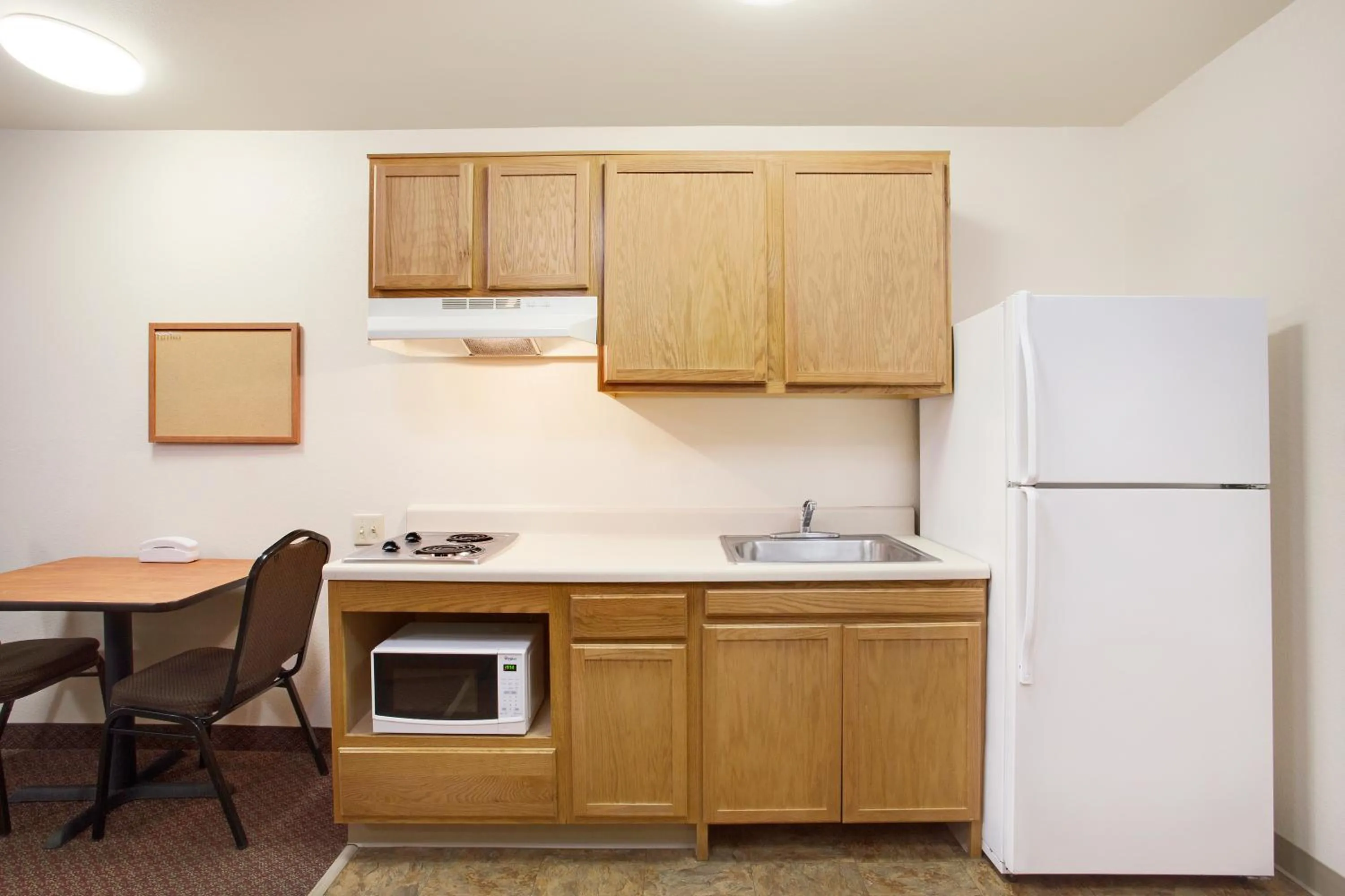 Kitchen or kitchenette in WoodSpring Suites Baton Rouge Airline Highway