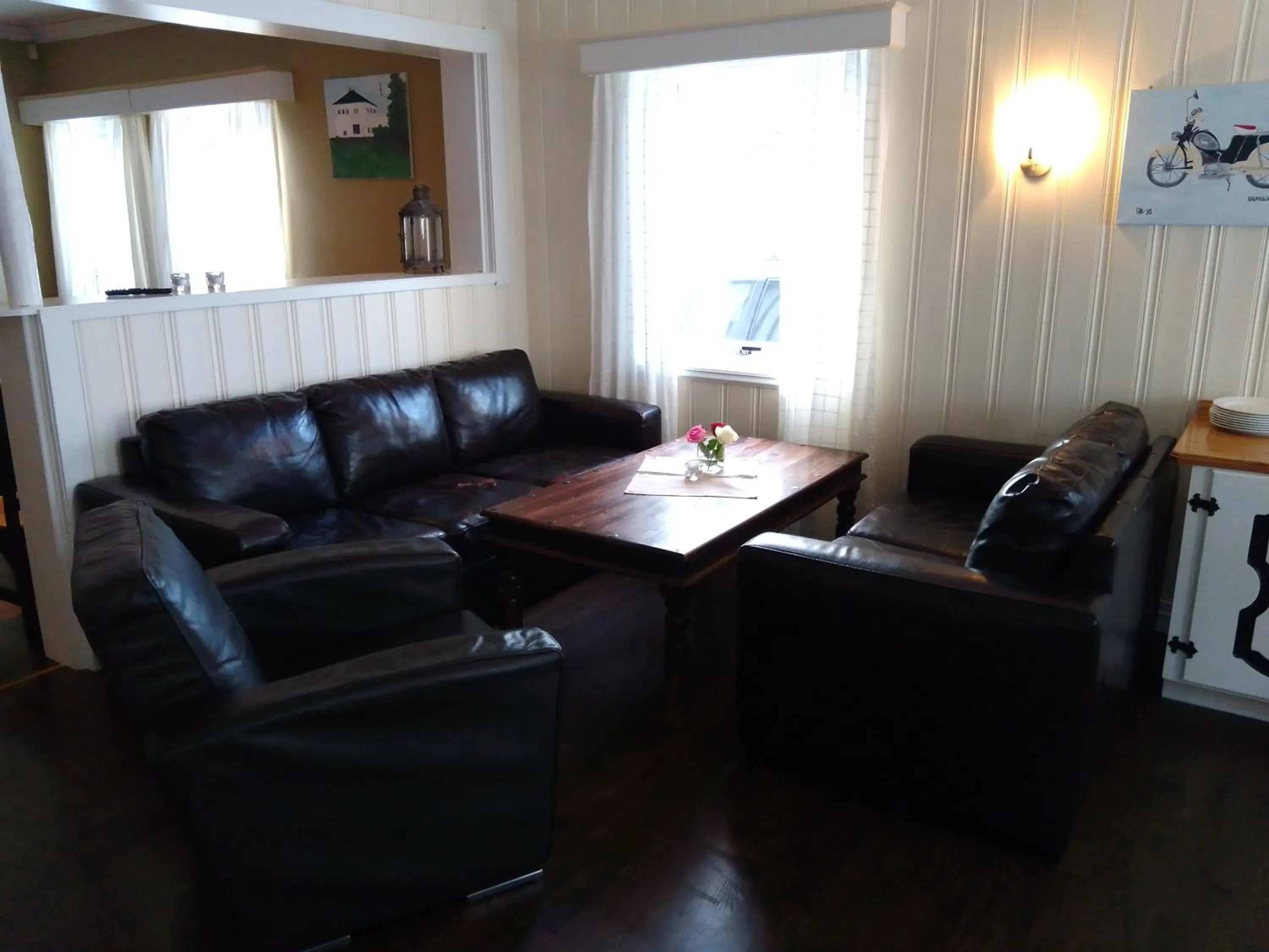 Communal lounge/ TV room in Badeland Gjestegård