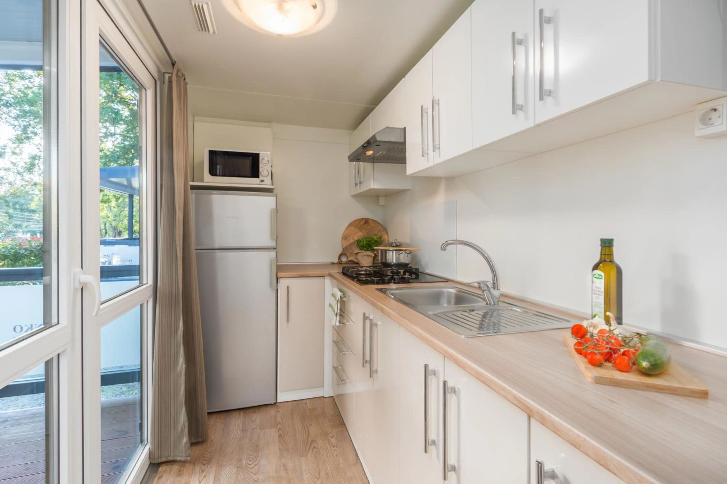 Kitchen or kitchenette in Mobile Homes Banko in Bijela Uvala and Zelena laguna