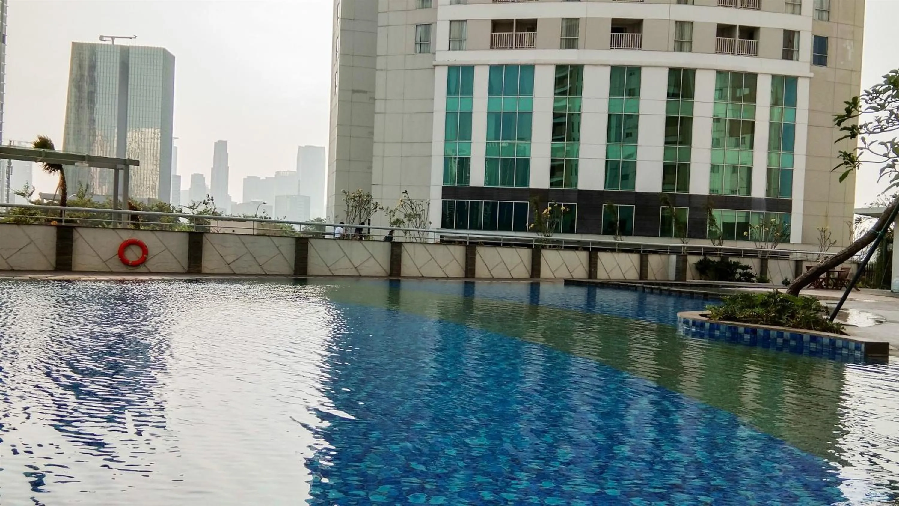 Property building in Amazing 2BR with City View The Wave Kuningan Apartment By Travelio