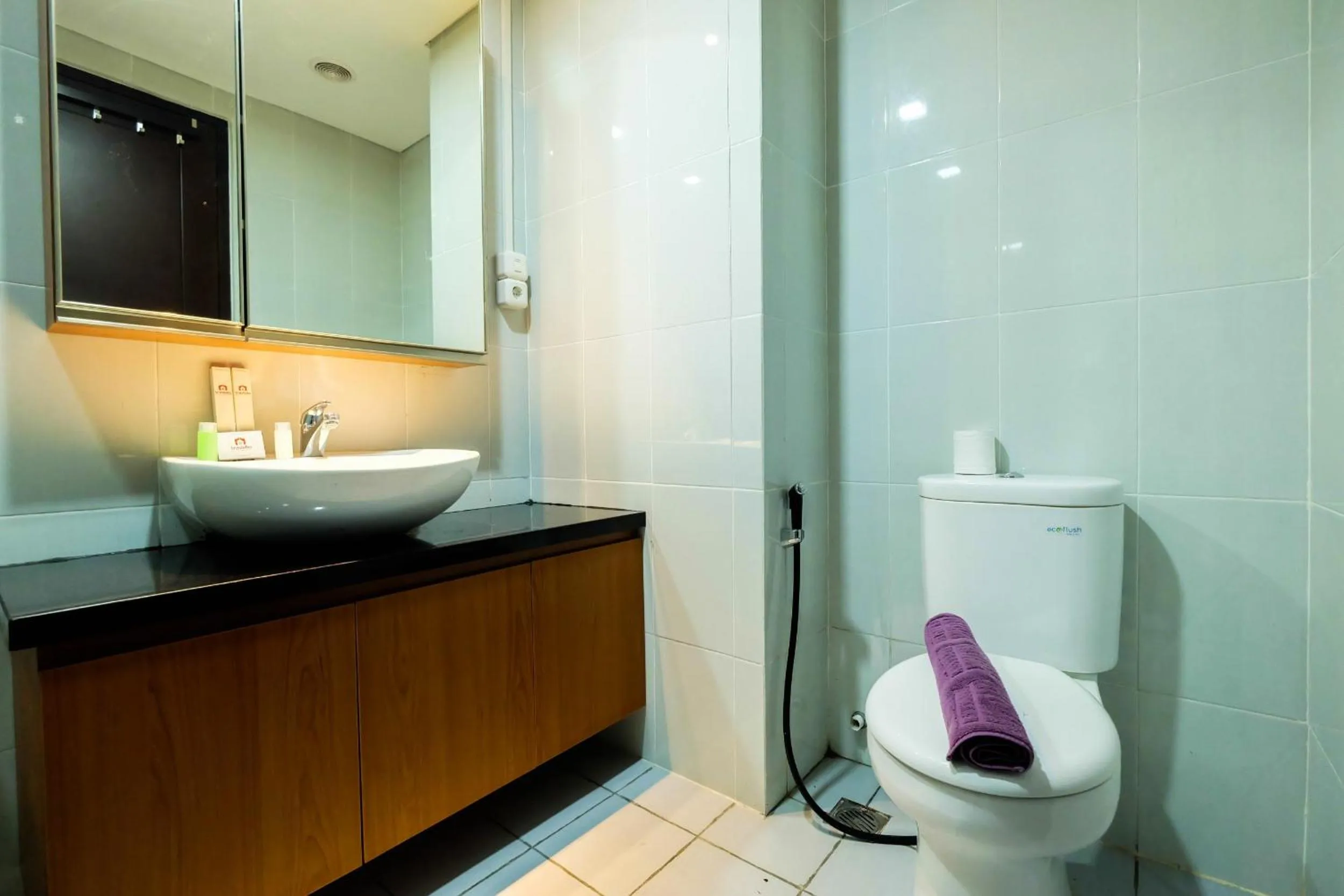Bathroom in Exclusive 1BR Casa De Parco Apartment near AEON Mall By Travelio