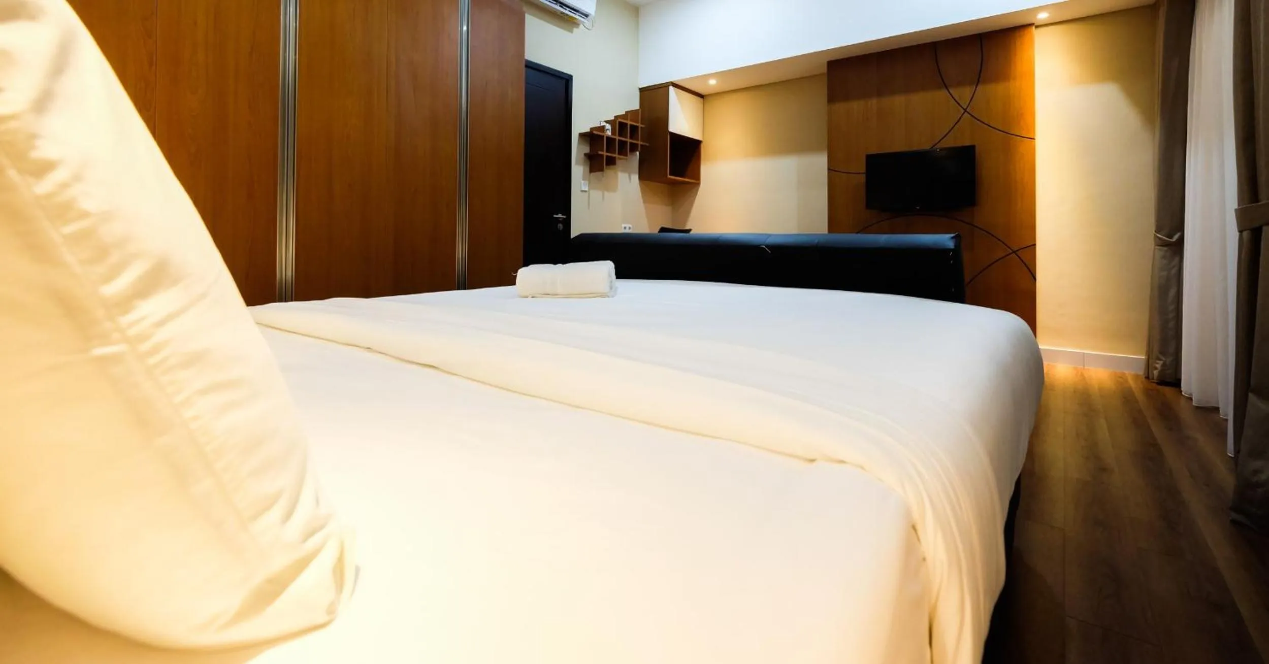 Bedroom, Bed in Exclusive 1BR Casa De Parco Apartment near AEON Mall By Travelio