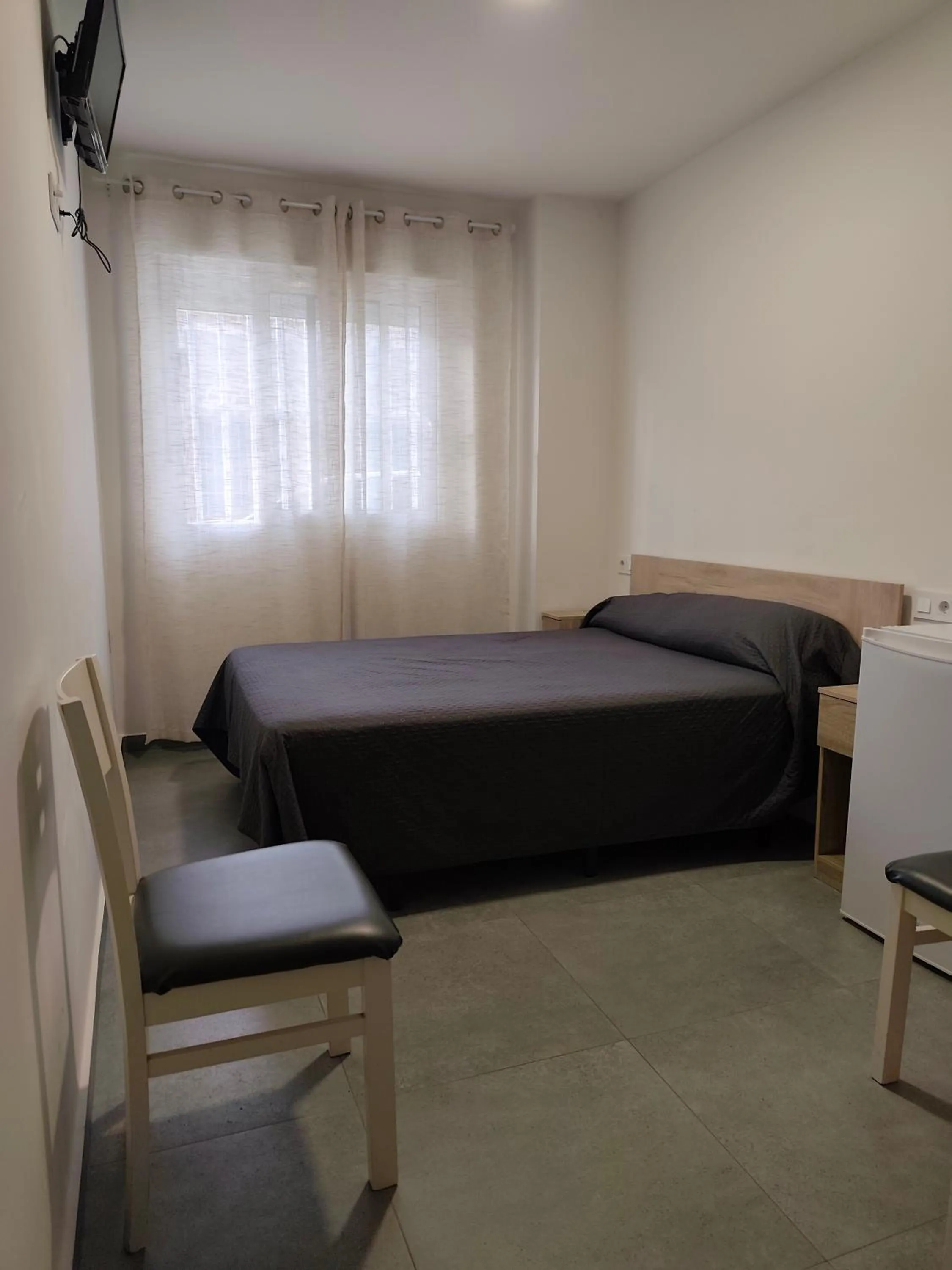 Bed in Pension La Puntica