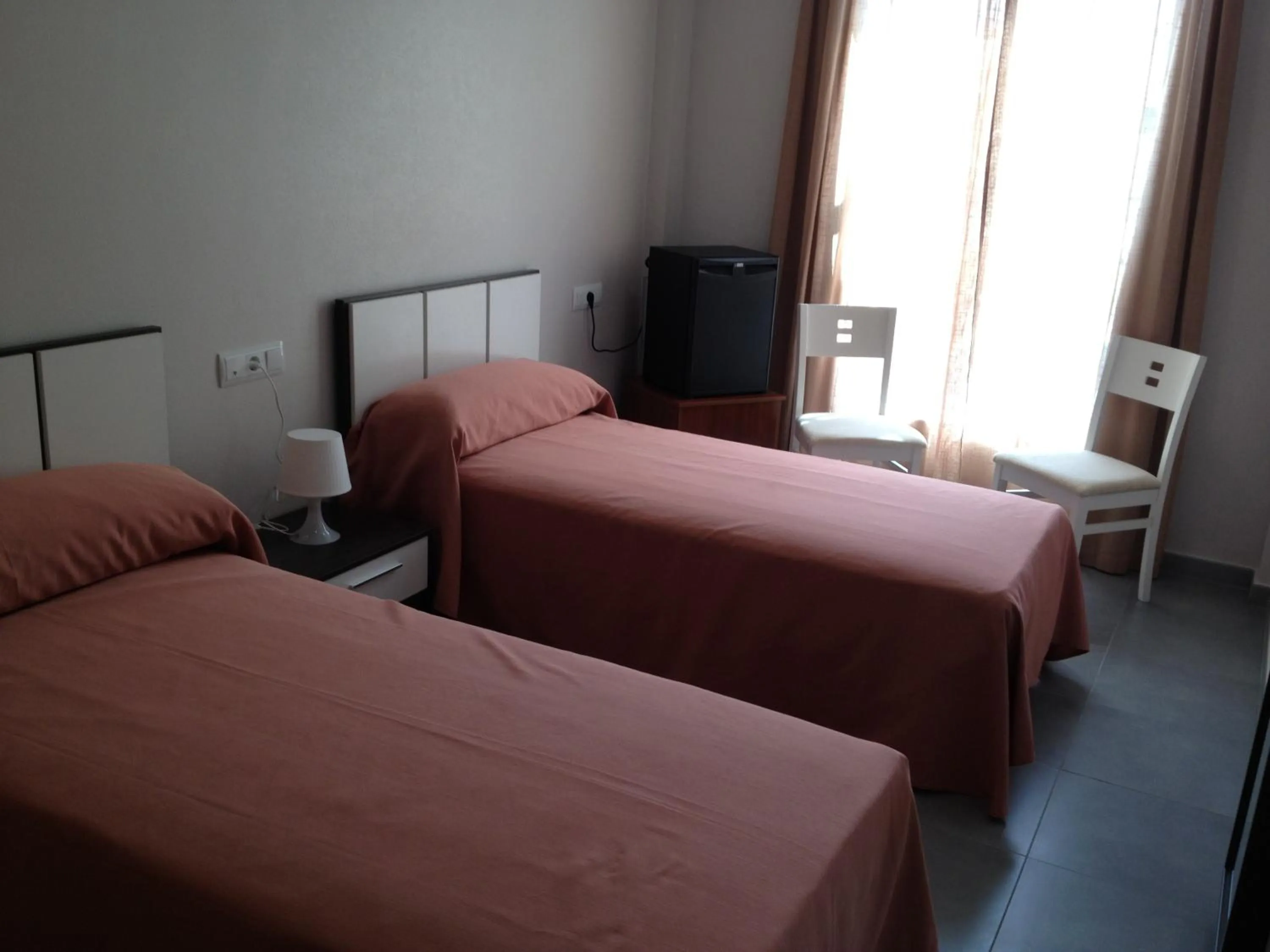 Bed in Pension La Puntica