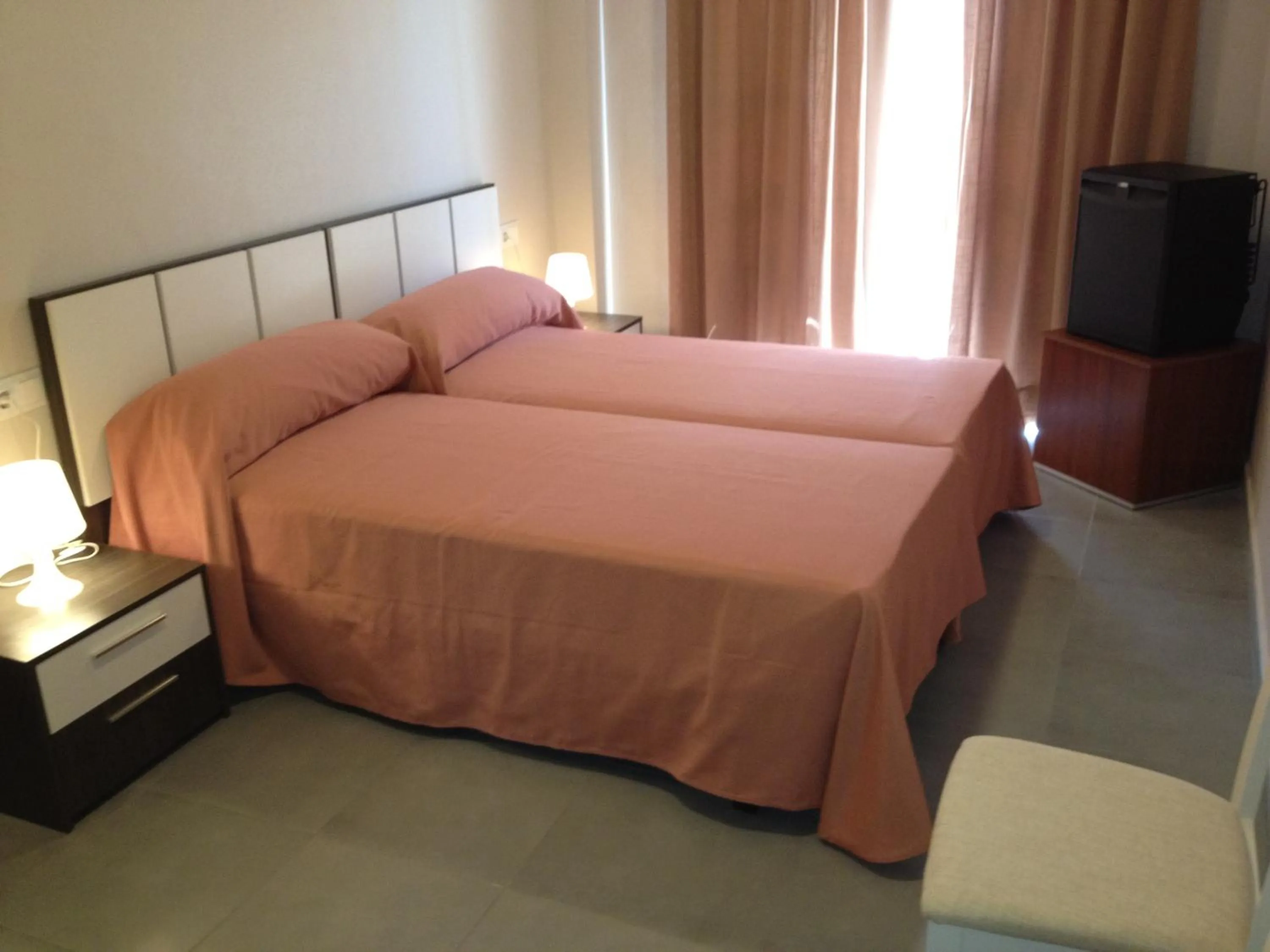 Bed in Pension La Puntica