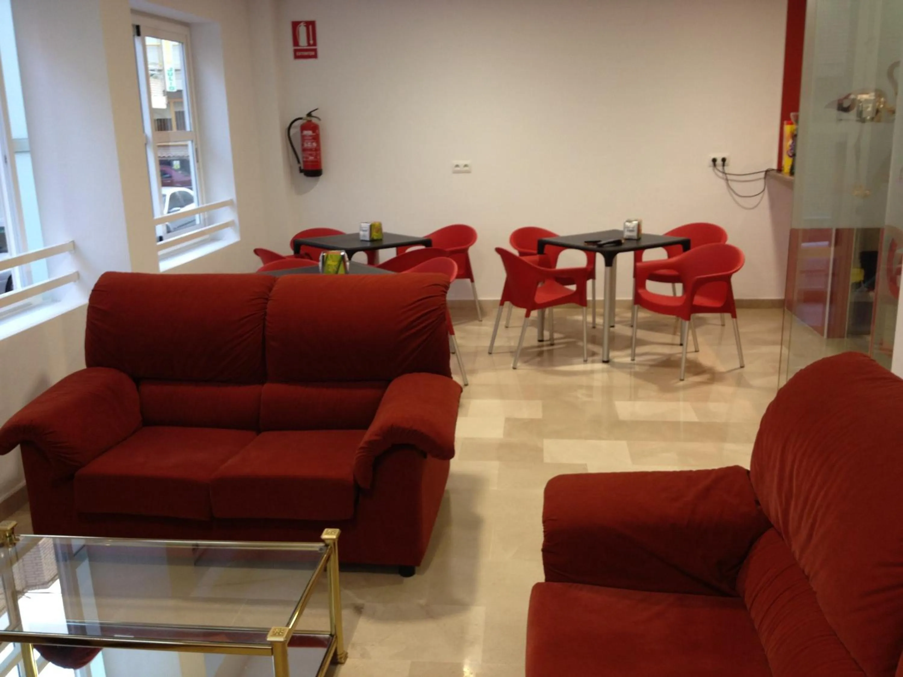 Communal lounge/ TV room in Pension La Puntica