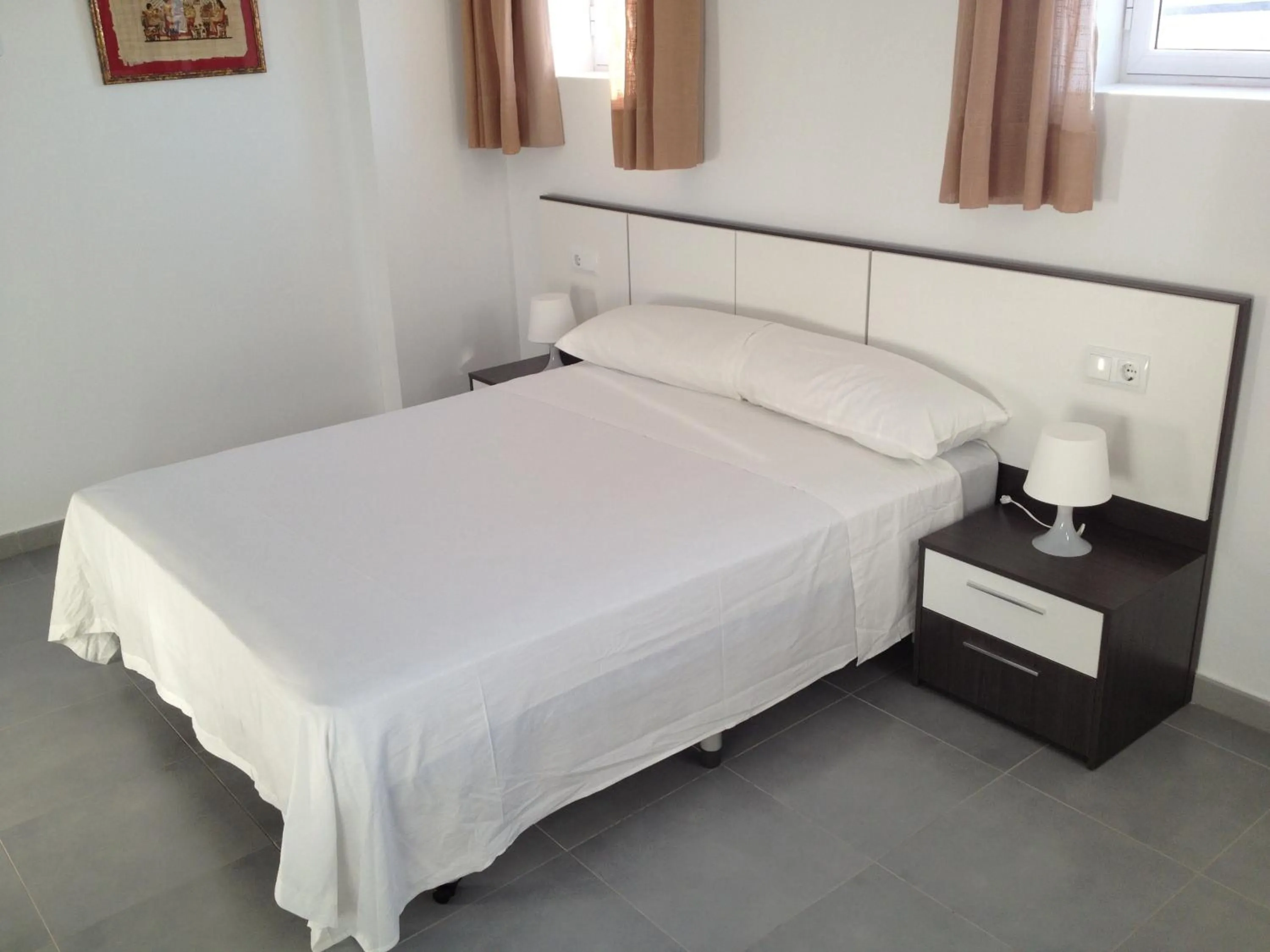 Bed in Pension La Puntica