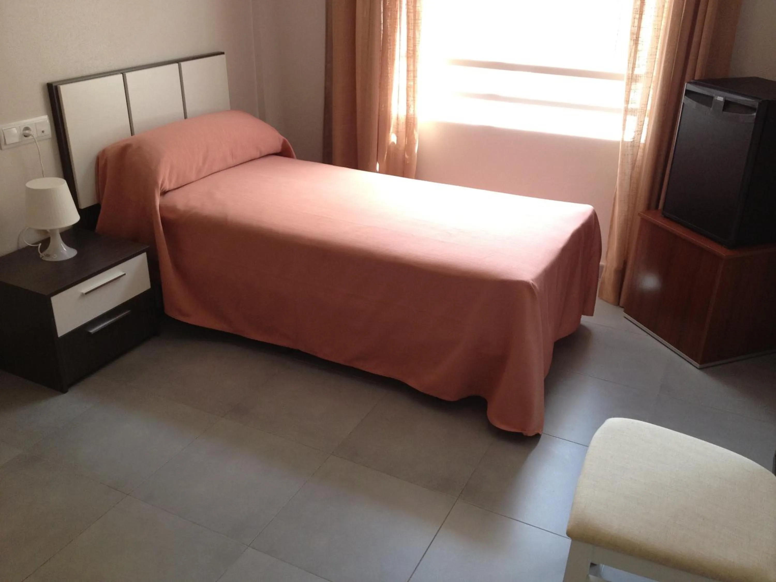 Bed in Pension La Puntica