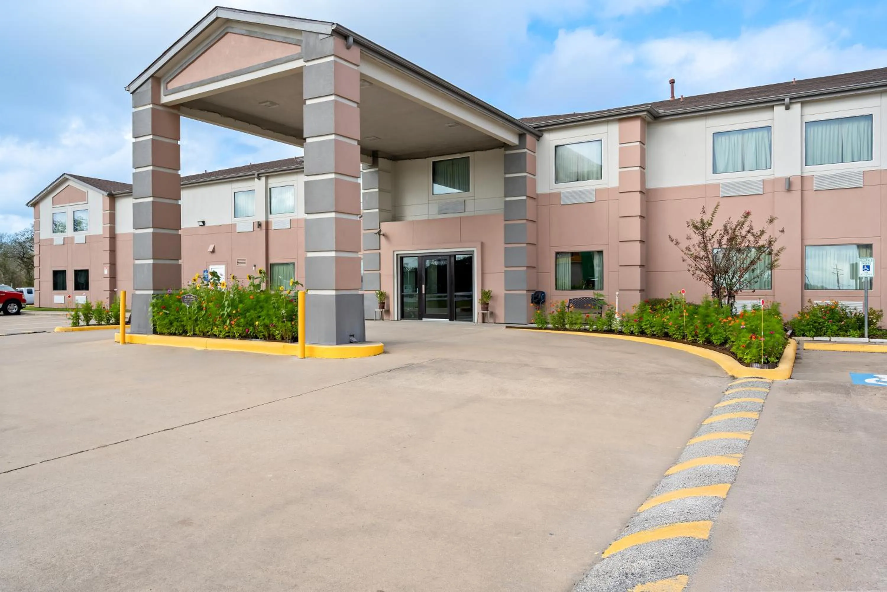 Property building in Americas Best Value Inn Somerville Texas