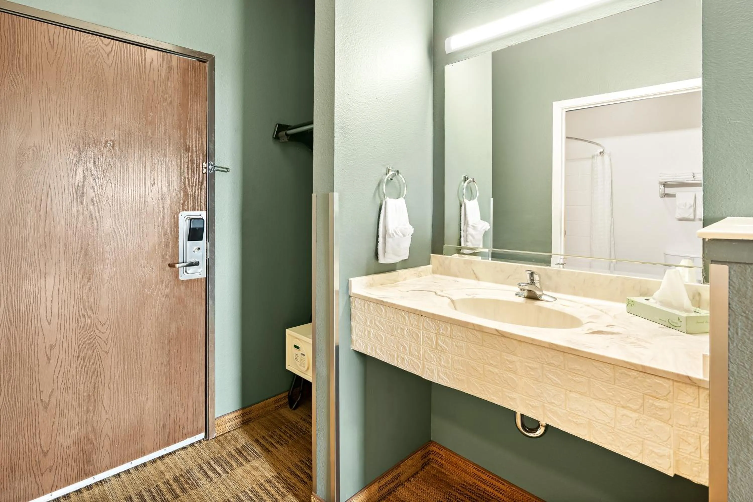 Shower in Americas Best Value Inn Somerville Texas