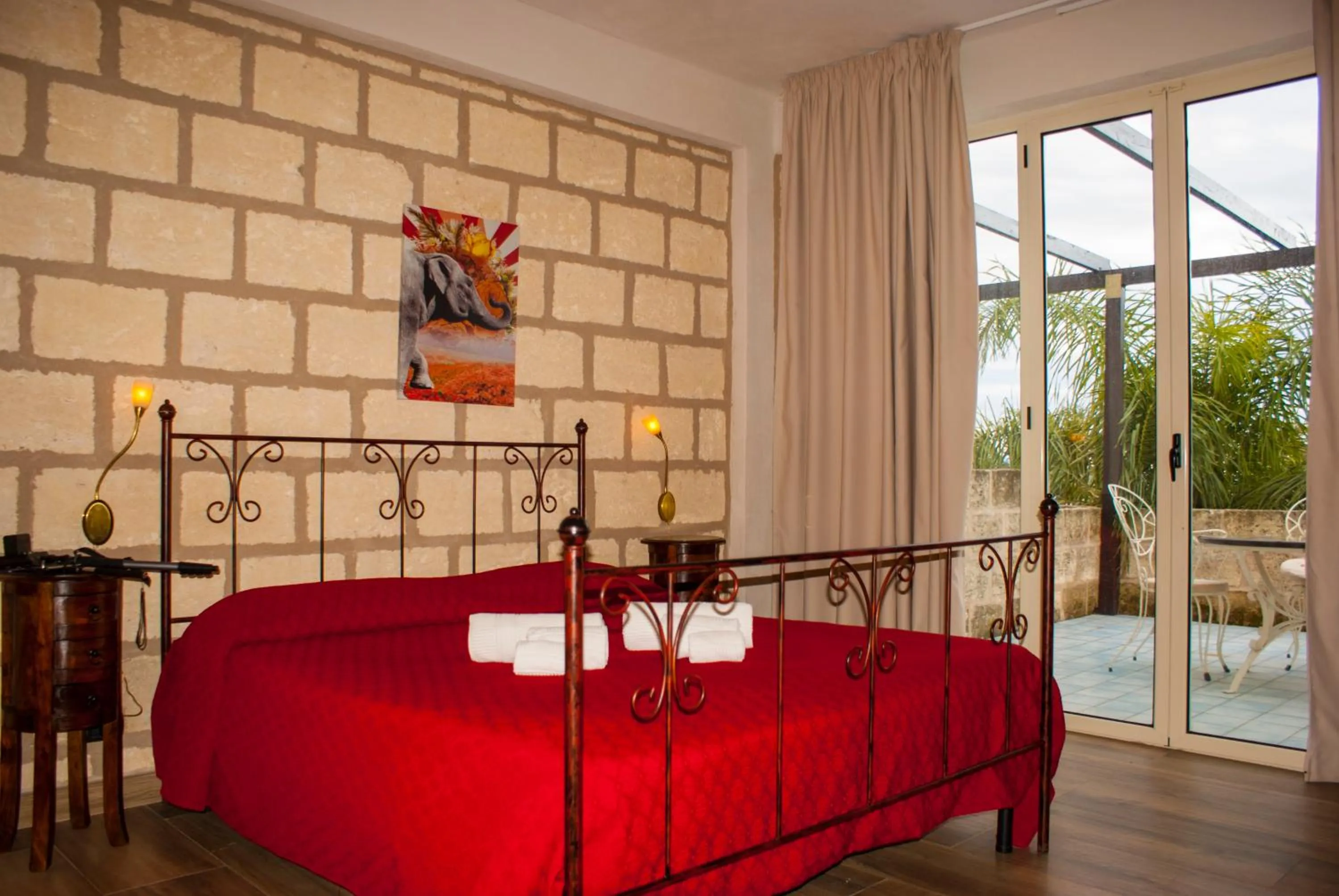 Photo of the whole room, Bed in CapoSperone Resort
