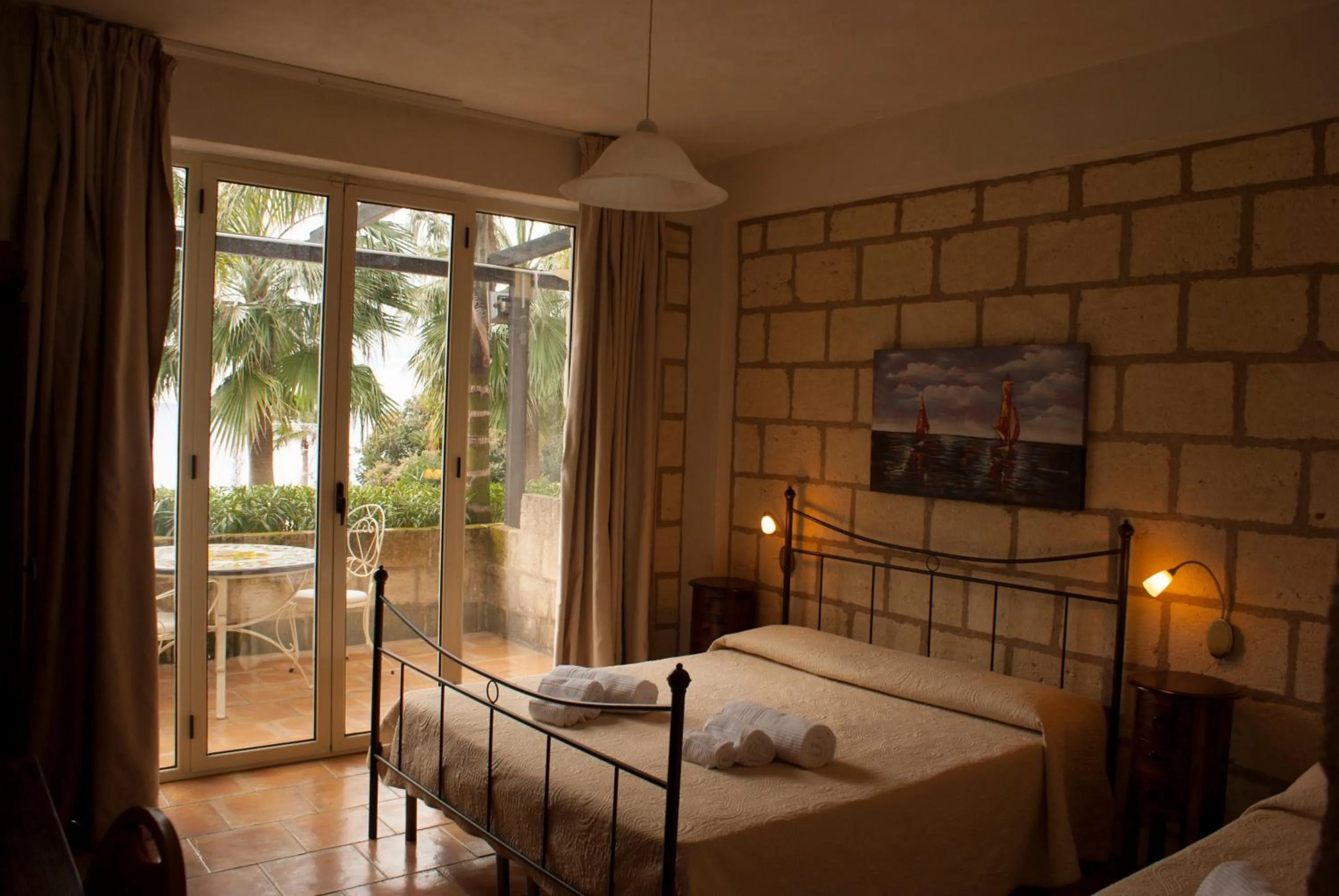 Bed in CapoSperone Resort