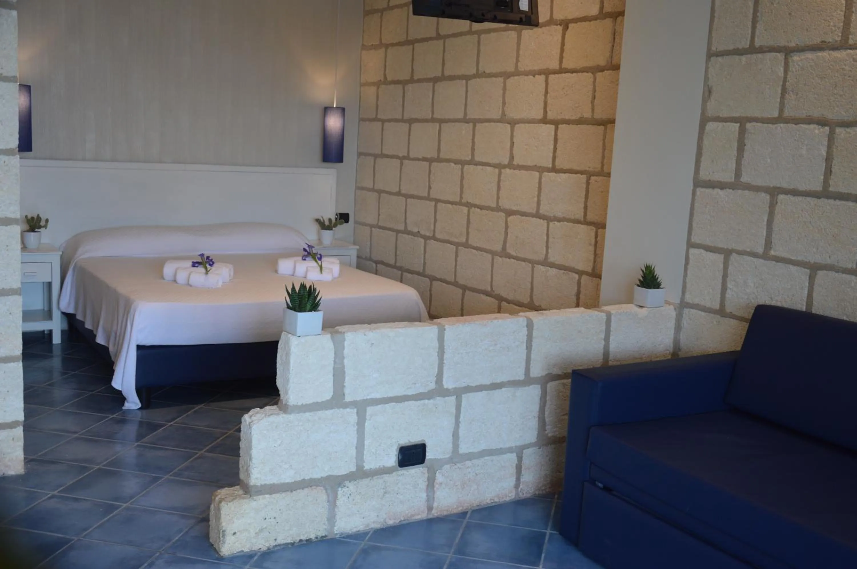 Bed in CapoSperone Resort