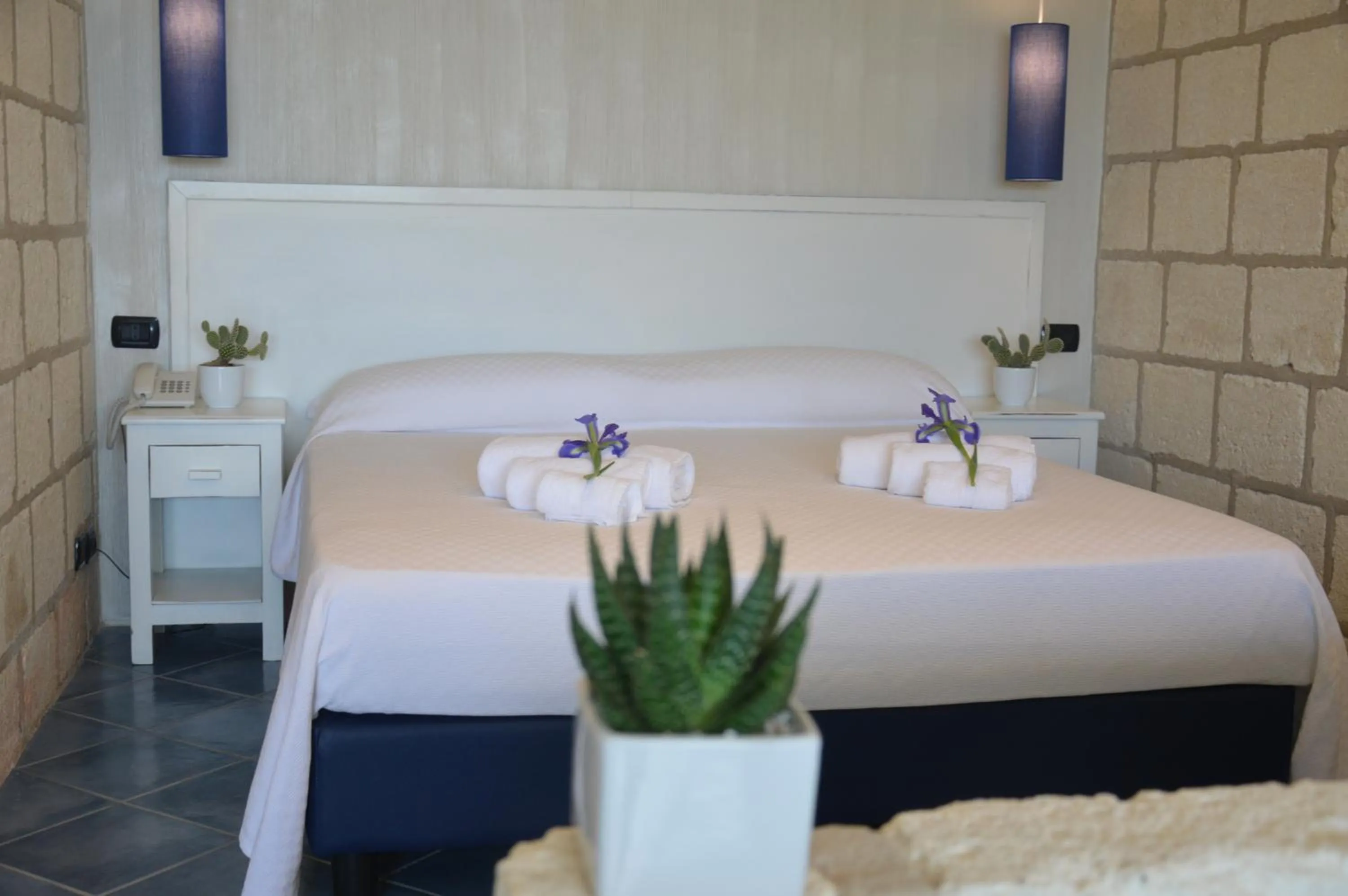 Bed in CapoSperone Resort