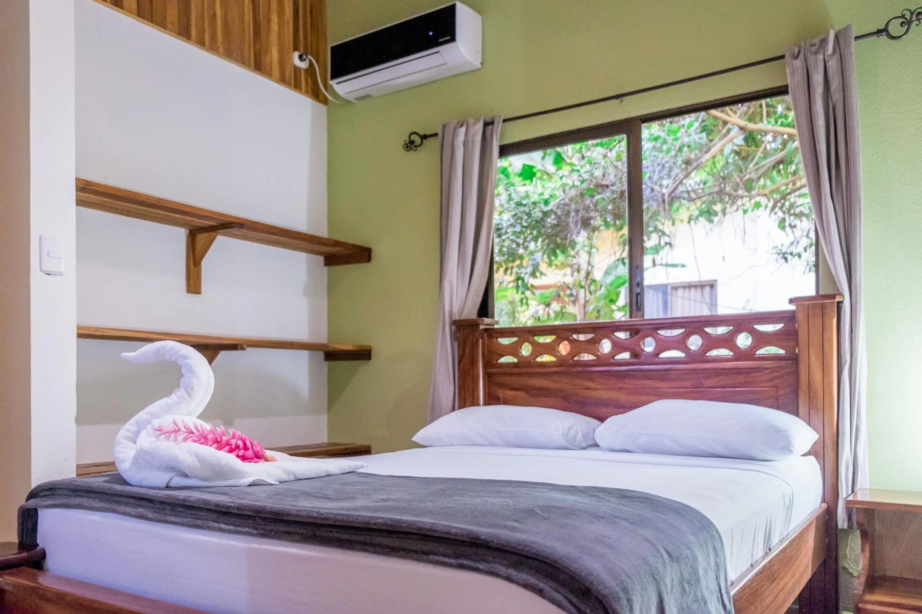 Bed in Zula Inn Aparthotel