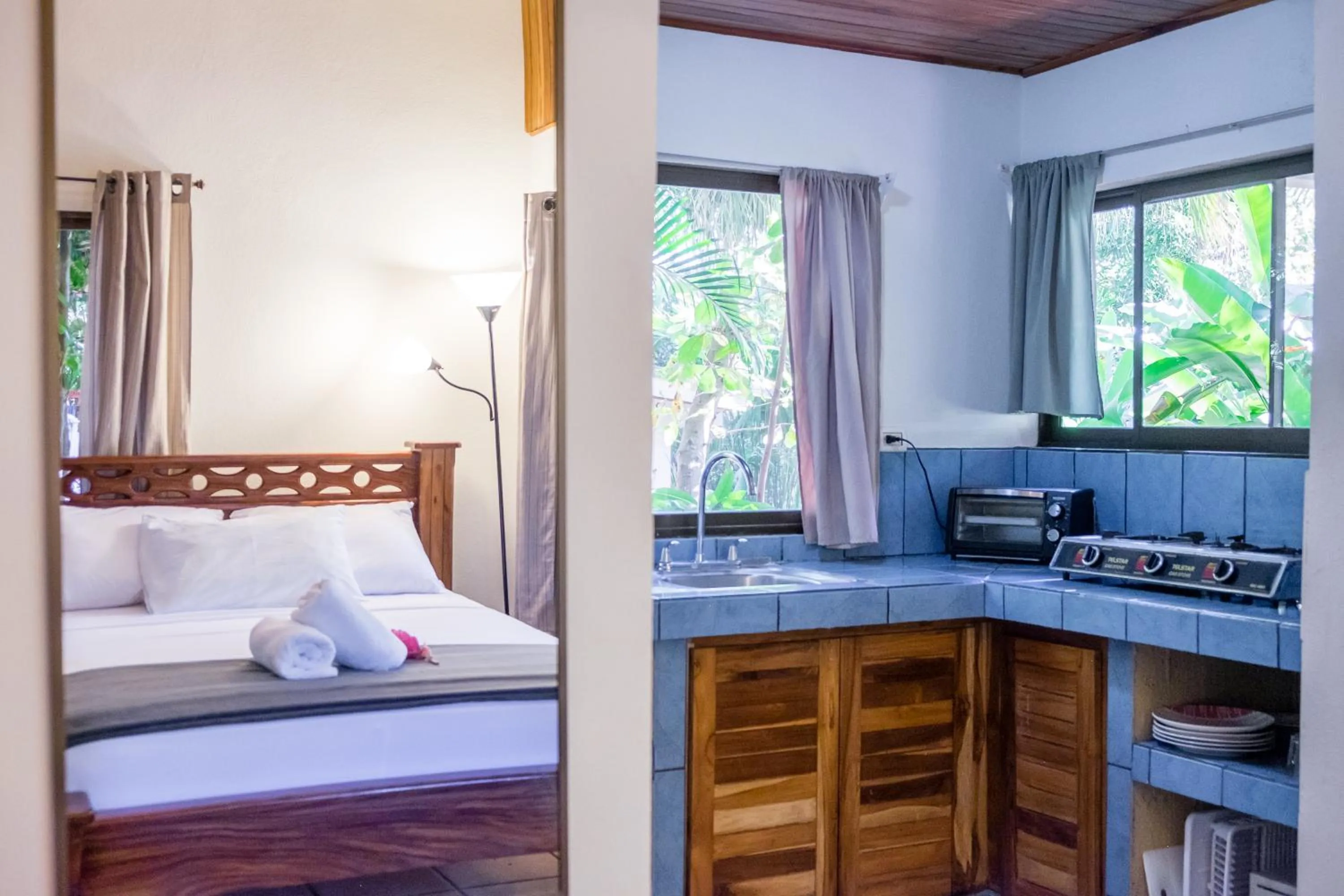 Bed in Zula Inn Aparthotel