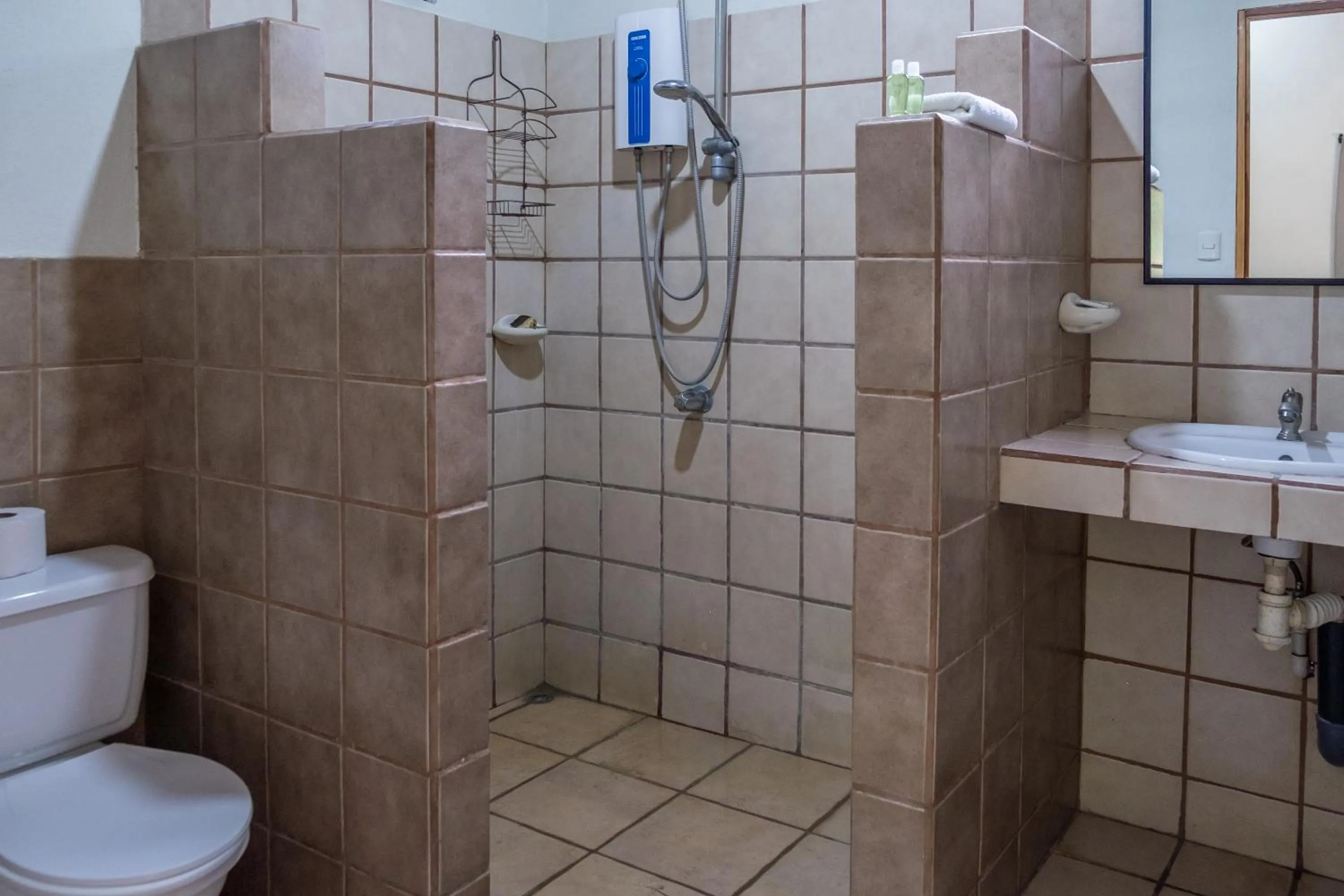 Shower in Zula Inn Aparthotel