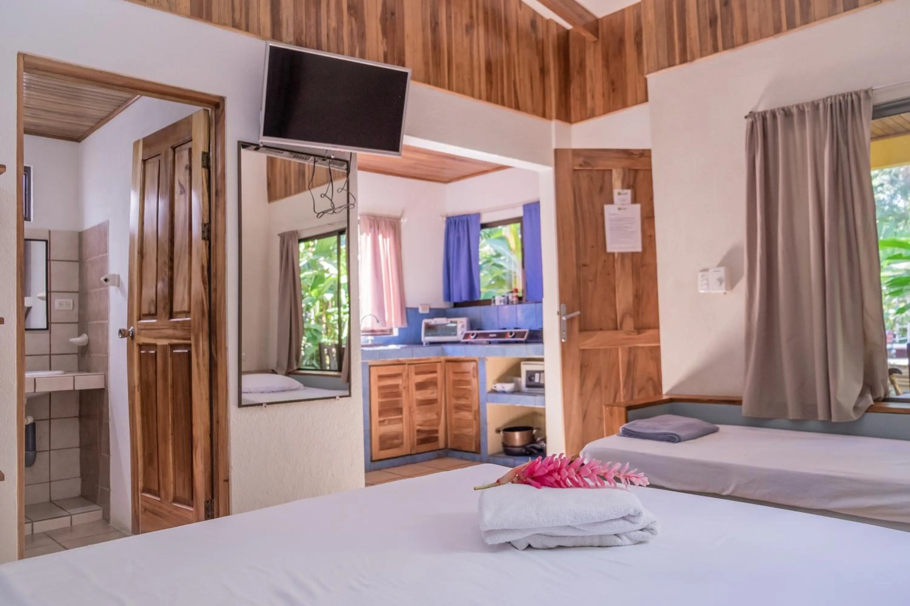 Bed in Zula Inn Aparthotel