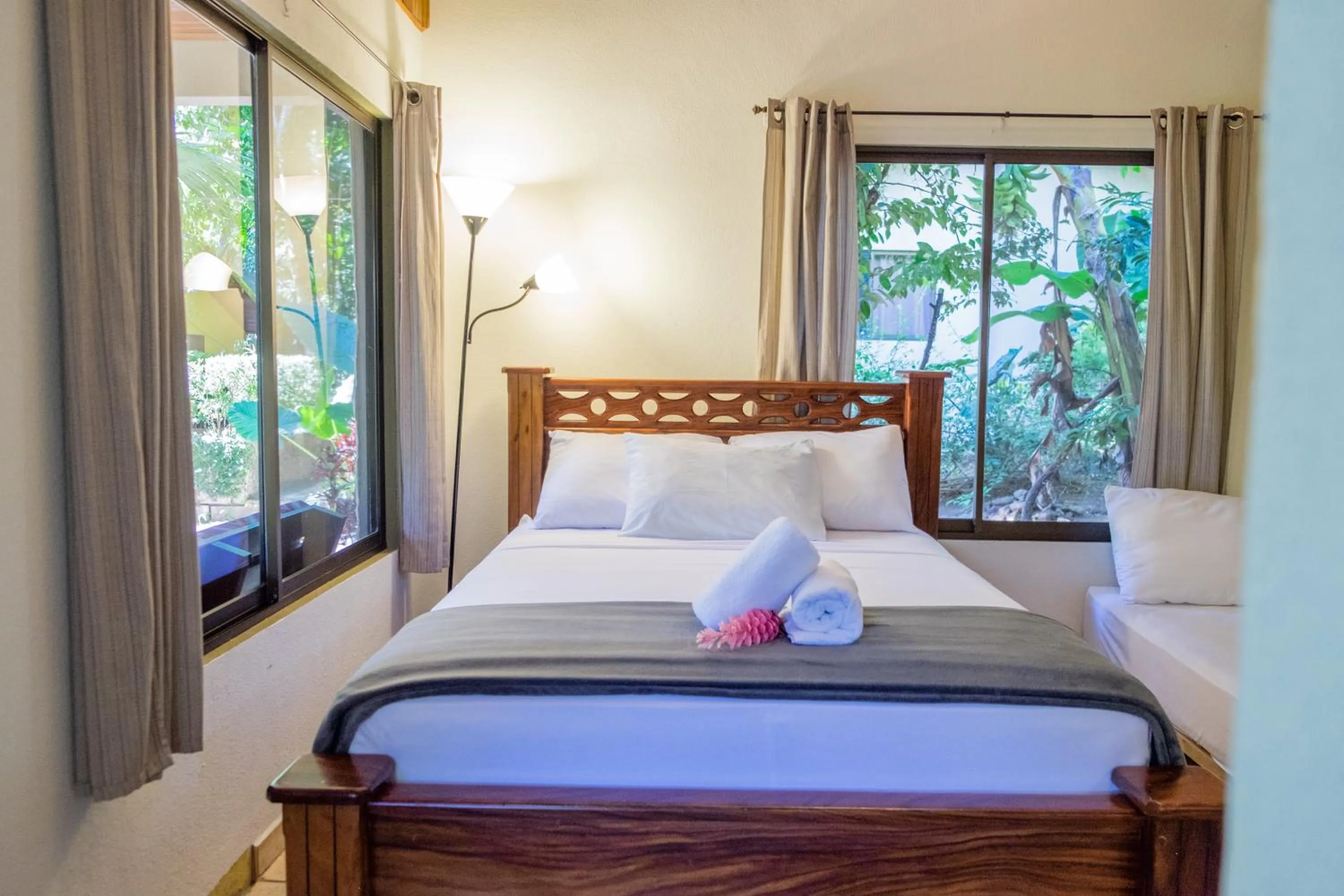 Bed in Zula Inn Aparthotel